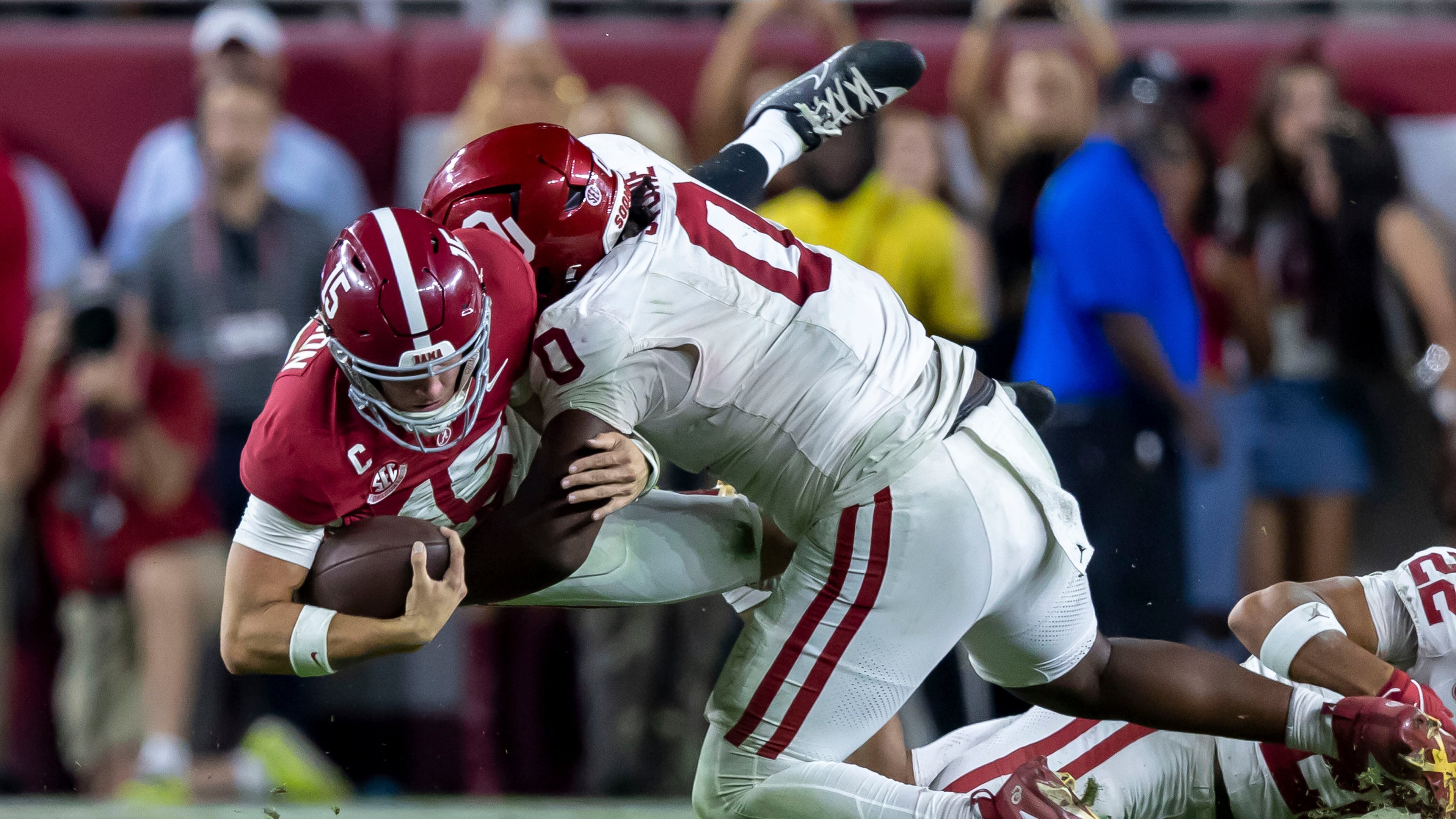 Alabama quarterback Ty Simpson (left) is tackled by Oklahoma defensive tackle David Stone during their game on Saturday, Nov. 15, 2025, in Tuscaloosa, Ala. Oklahoma plays No. 2-ranked Georgia at 3:30 p.m. Saturday. (Vasha Hunt/AP)