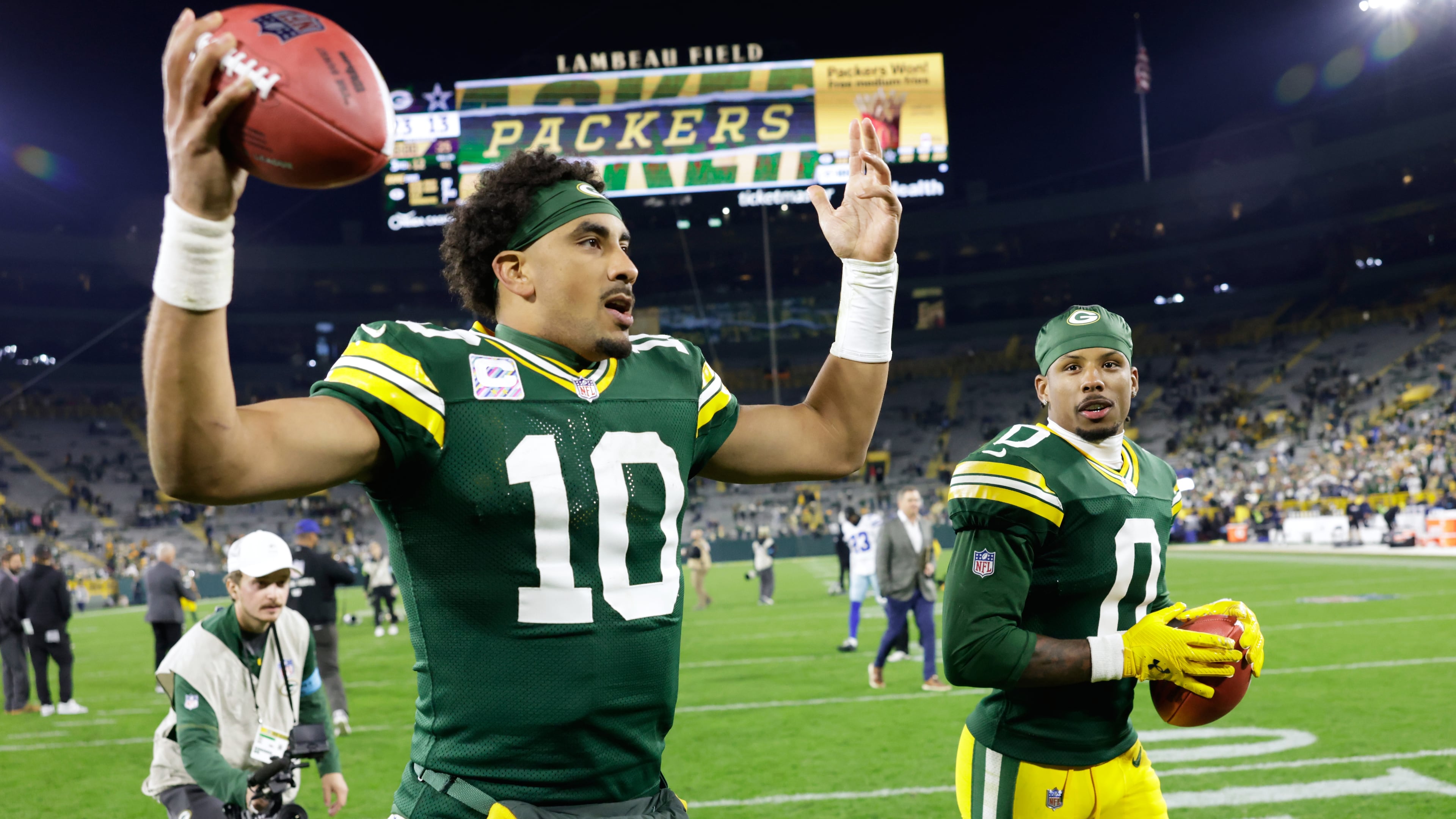 Green Bay Packers' Jordan Love and Matthew Golden celebrate after an NFL football game against the Dallas Cowboys in Green Bay, Wis., Sunday, Oct. 18, 2026. (AP Photo/Matt Ludtke)