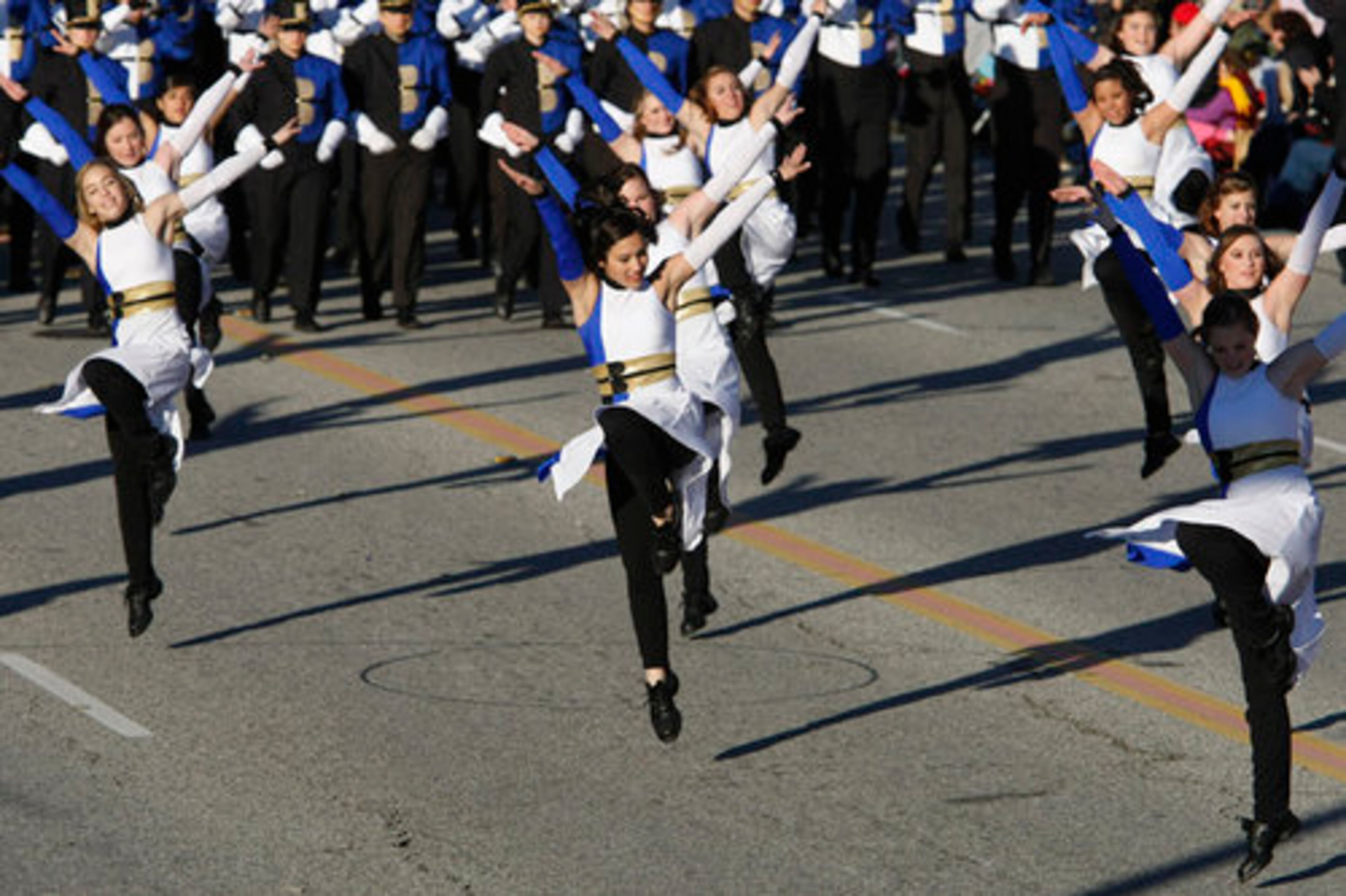 The dance troupe for the All-Birdville Marching Band from Birdville, Texas, runs through its routine.