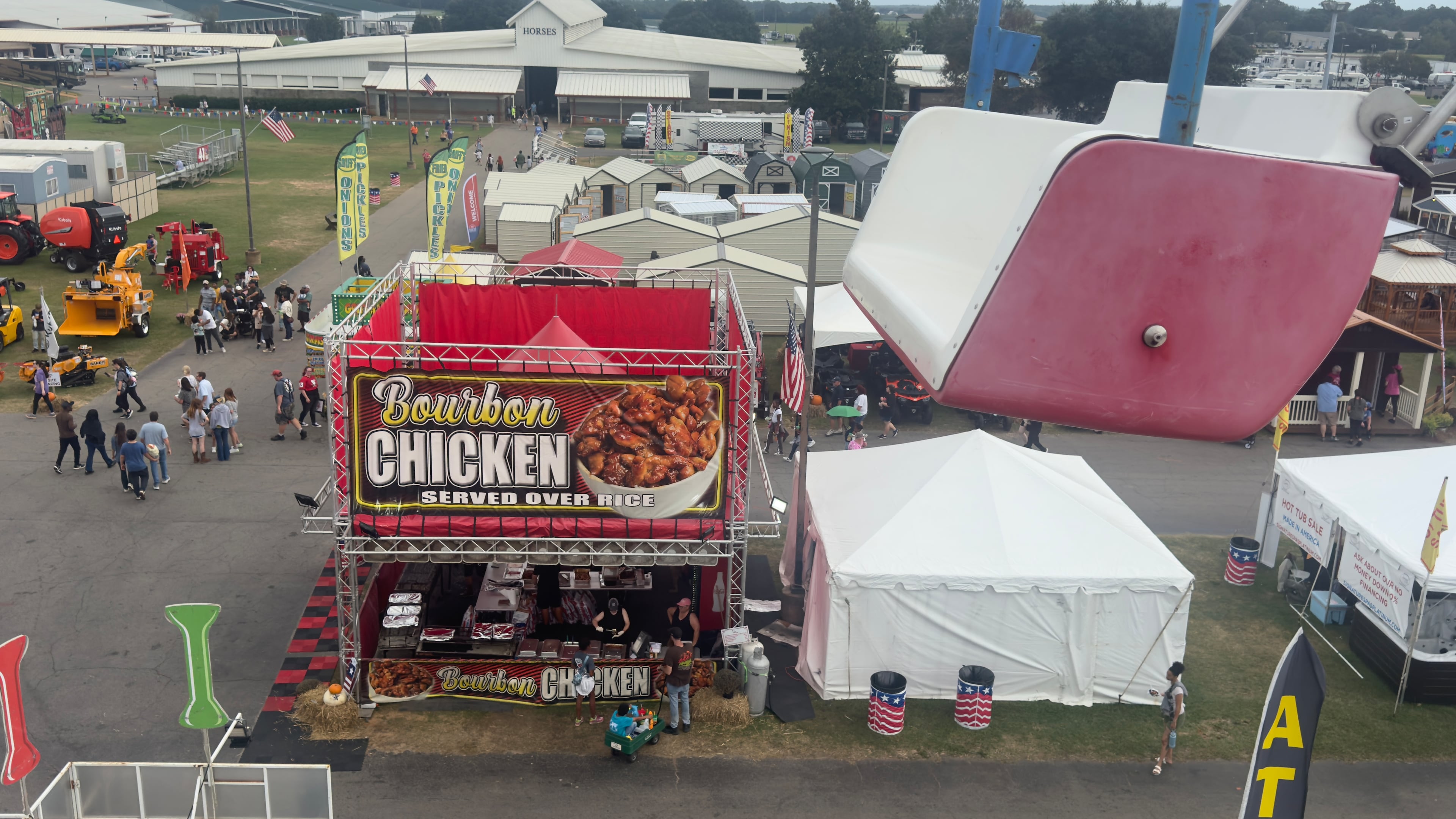 The Agri-Lift ride at the Georgia National Fair, an attraction that opened in 2001, treats passengers to an overhead view of the annual Perry fair. (Joe Kovac Jr./AJC)