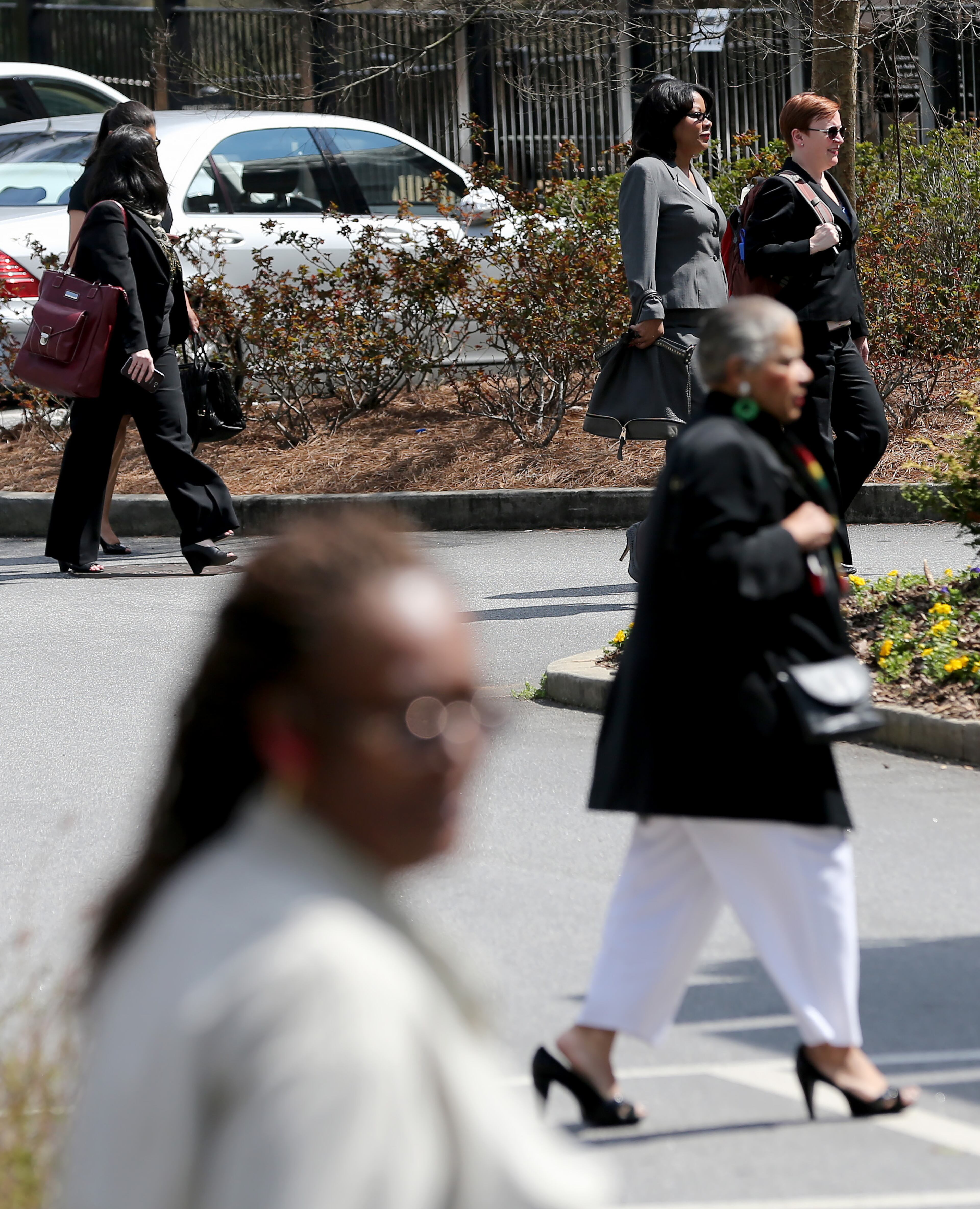 People arrive for a memorial for former Atlanta Public School Superintendent Beverly Hall at The Episcopal Cathedral of St. Philip on Tuesday afternoon March 17, 2015. Ben Gray / bgray@ajc.com