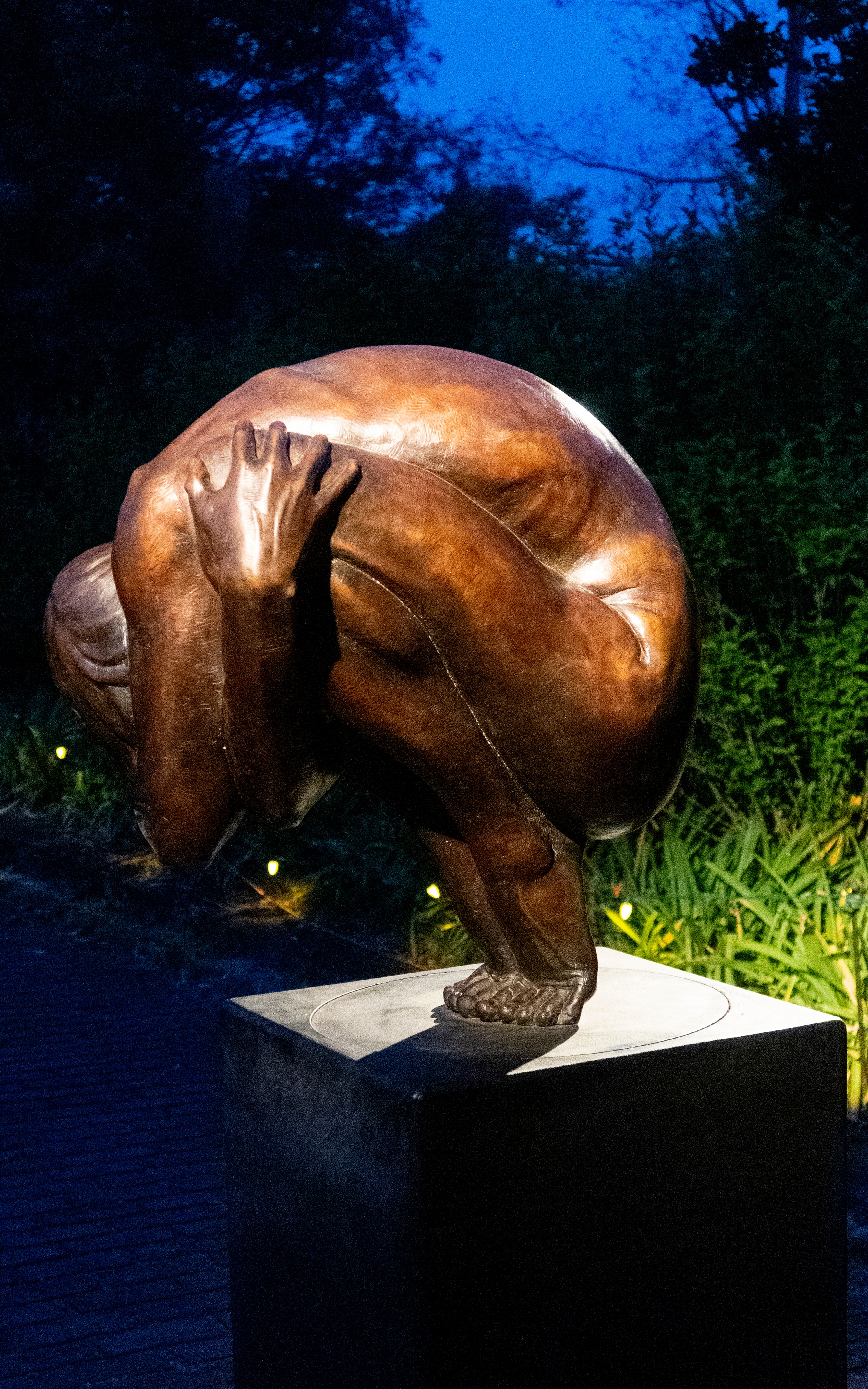 Kevin Chambers’ “Awaken,” a classic figurative sculpture, is featured during "Illumine." Guests can get a 360-degree view of the work by spinning its base. (Photo by George Gomez / courtesy of Oakland Cemetery)