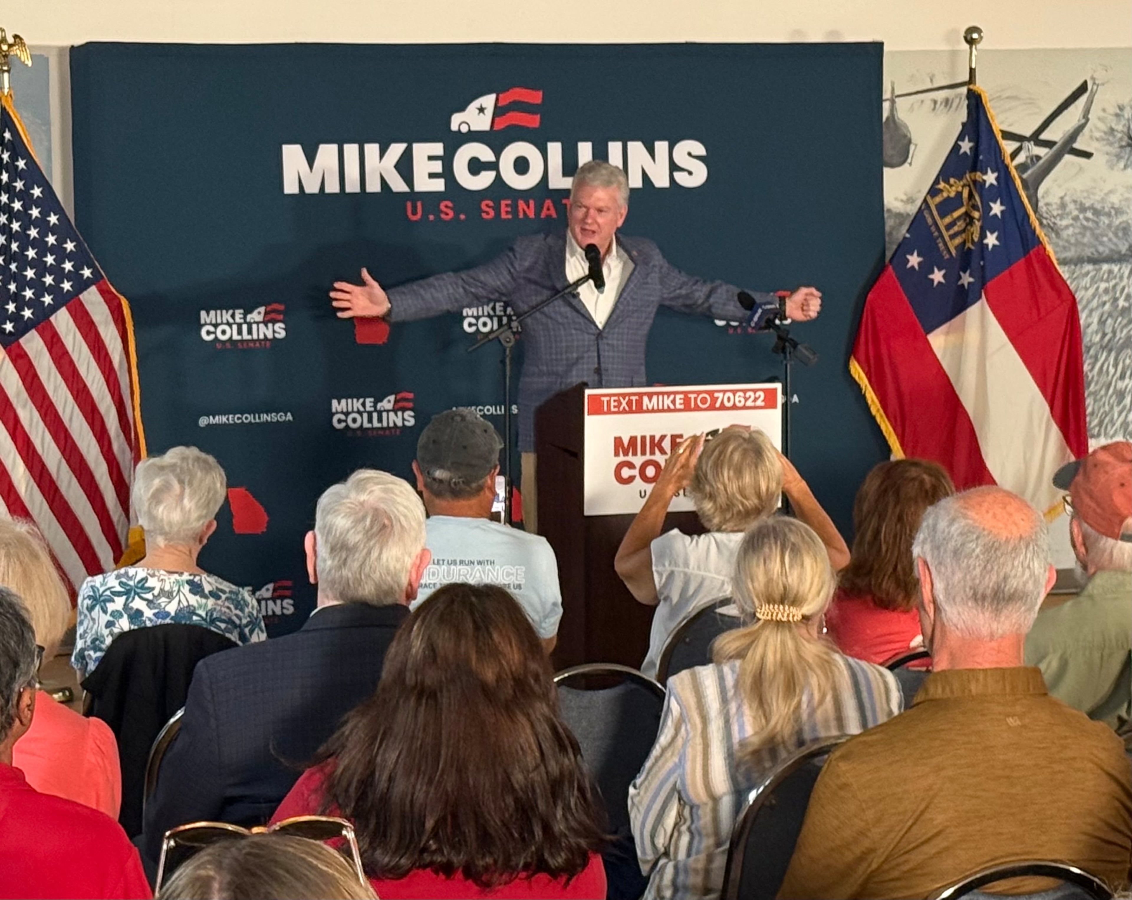 Republican U.S. Senate nominee Mike Collins addresses the VFW Hall in Acworth on Monday. (Greg Bluestein/AJC)