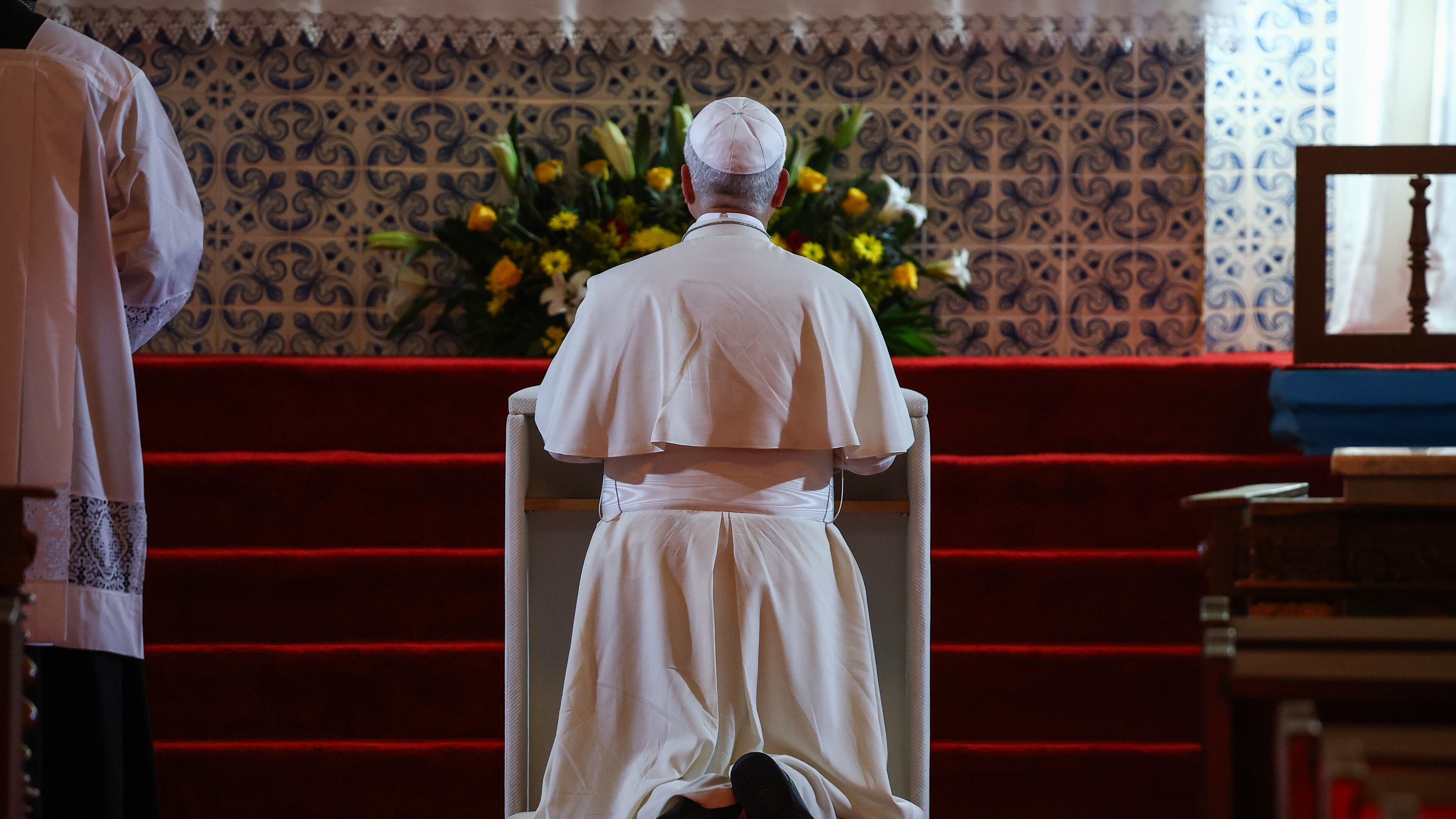 Pope Leo XIV prays inside the Church of Our lady of Muxima, on the seventh day of an 11-day apostolic journey to Africa, in Muxima, Angola, Sunday, April 19, 2026. (Guglielmo Mangiapane/Pool Photo via AP)
