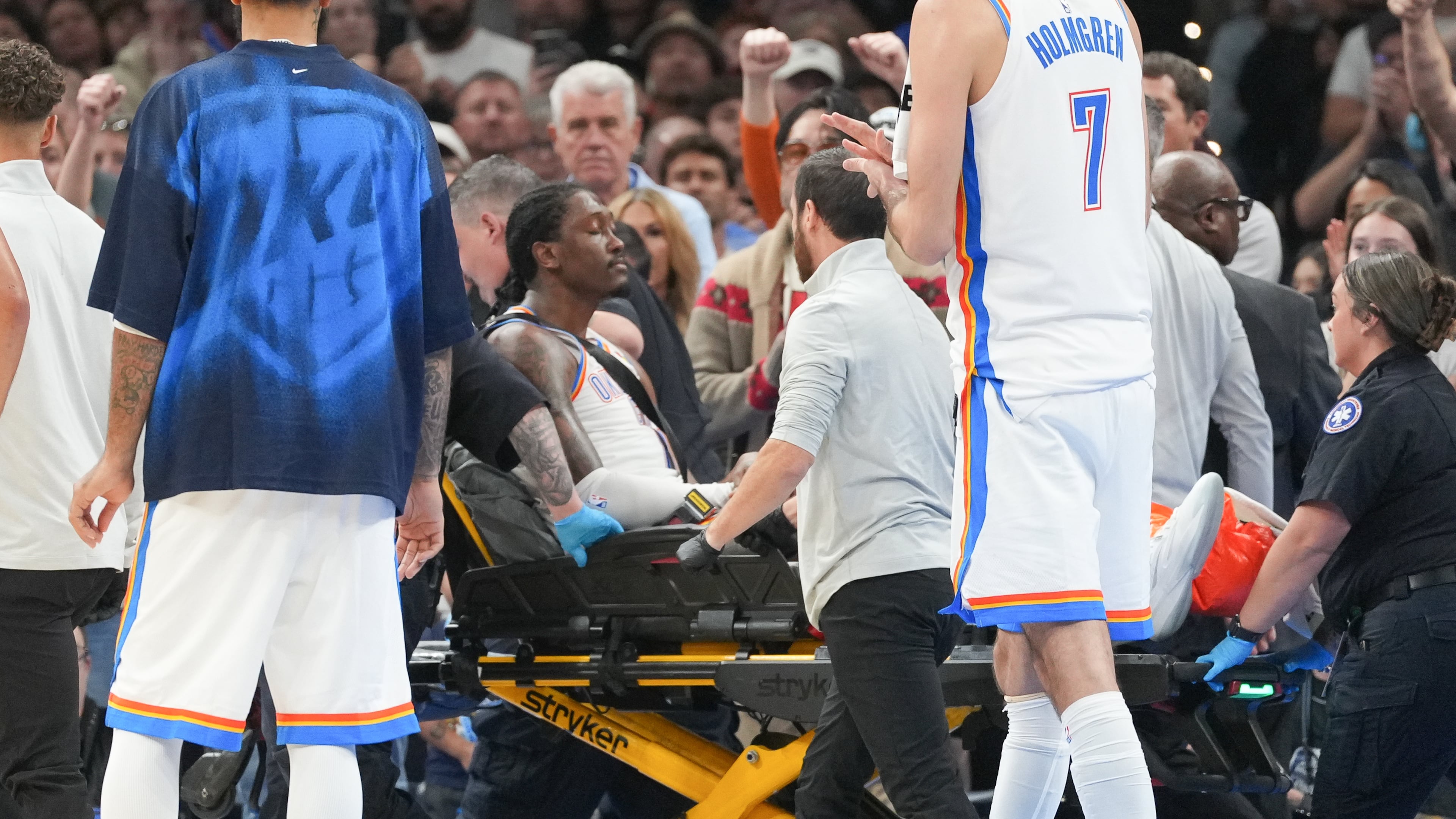 Oklahoma City Thunder guard Jalen Williams is taken off the court by medical staff during the second half of an NBA basketball game against the Los Angeles Clippers, Sunday, Oct. 25, 2026, in Oklahoma City. (AP Photo/Kyle Phillips)