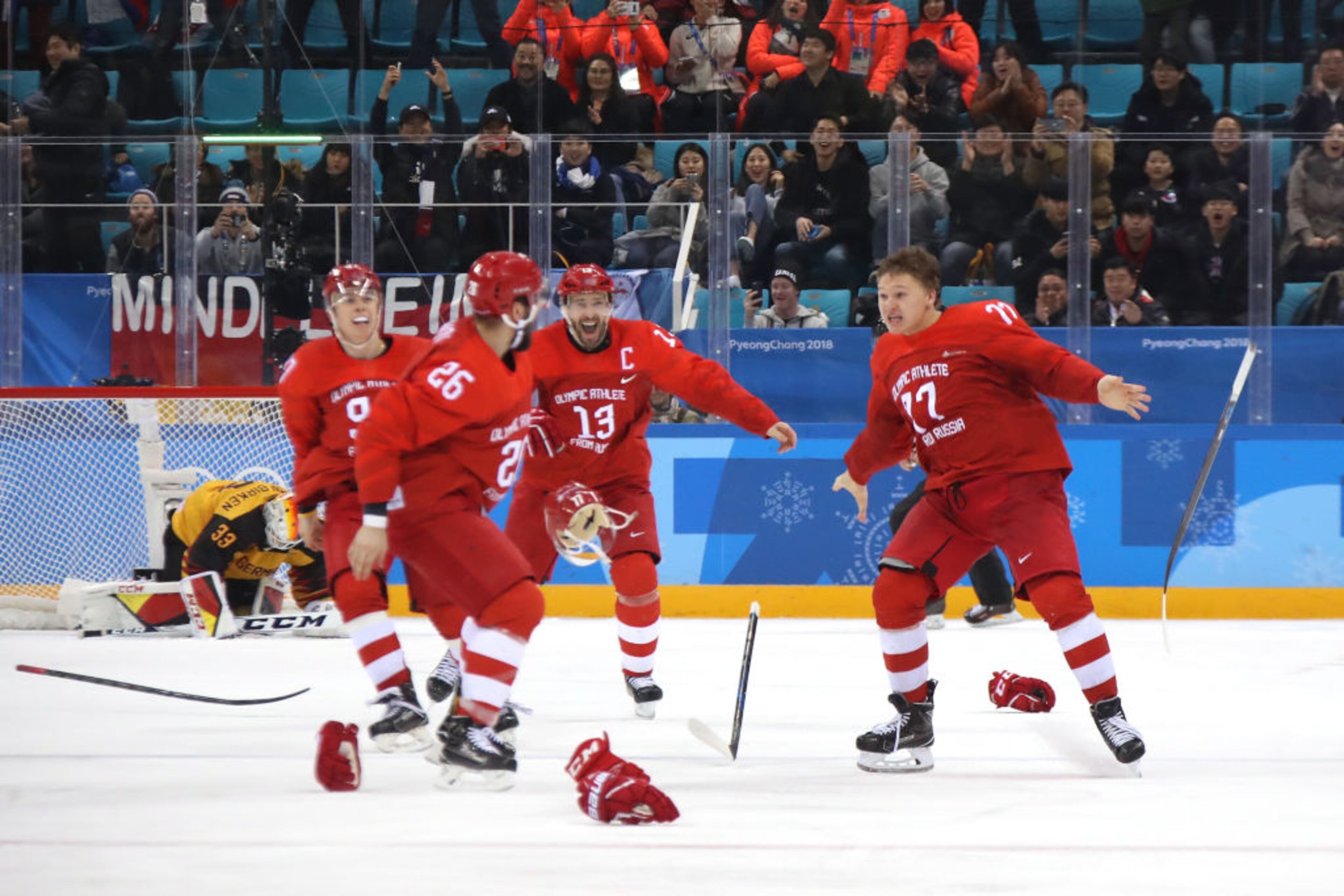 GANGNEUNG, SOUTH KOREA - FEBRUARY 25: Gold medal winner Kirill Kaprizov #77 of Olympic Athlete from Russia celebrates with teammates after scoring a goal in overtime to defeat Germany 4-3 during the Men's Gold Medal Game on day sixteen of the PyeongChang 2018 Winter Olympic Games at Gangneung Hockey Centre on February 25, 2018 in Gangneung, South Korea. (Photo by Bruce Bennett/Getty Images)