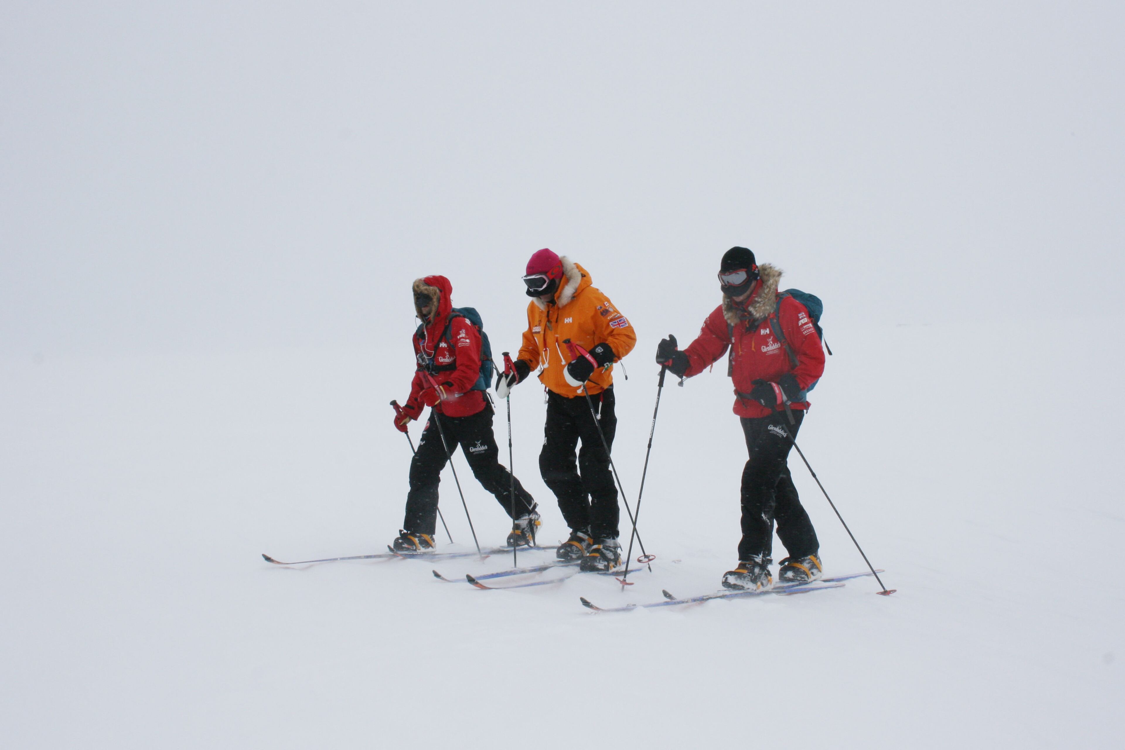 Undated photo issued Saturday Nov. 23, 2013, by Walking with the Wounded (WWTW) charity, Britain's Prince Harry, right, takes part in acclimatization ski training in Novo, Antarctica. Prince Harry is patron of Team UK in the Virgin Money South Pole Allied Challenge 2013 expedition which will see participants race across three degrees to the South Pole. Injured service personnel from Britain, America, Canada and Australia who have overcome life-changing injuries and undertaken challenging training programs to prepare for the conditions they will face in Antarctica, trekking around 15km to 20km per day, the teams will endure temperatures as low as minus 45C and 50mph winds as they pull their 70kg sleds, known as pulks, towards the southernmost point on the globe. (AP Photo / WWTW, PA) UNITED KINGDOM OUT - NO SALES - NO ARCHIVES