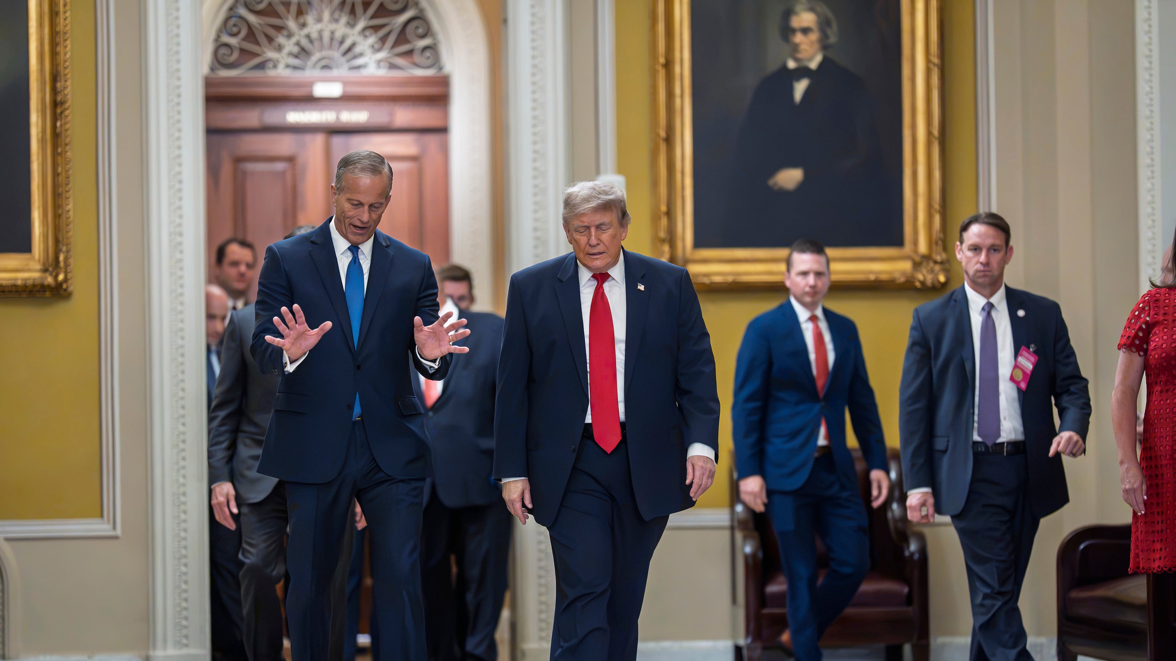 President Donald Trump, escorted by Senate Majority Leader John Thune, R-S.D., heads to a meeting with Senate Republicans at the Capitol in Washington, Wednesday, June 24, 2026. (AP Photo/J. Scott Applewhite)