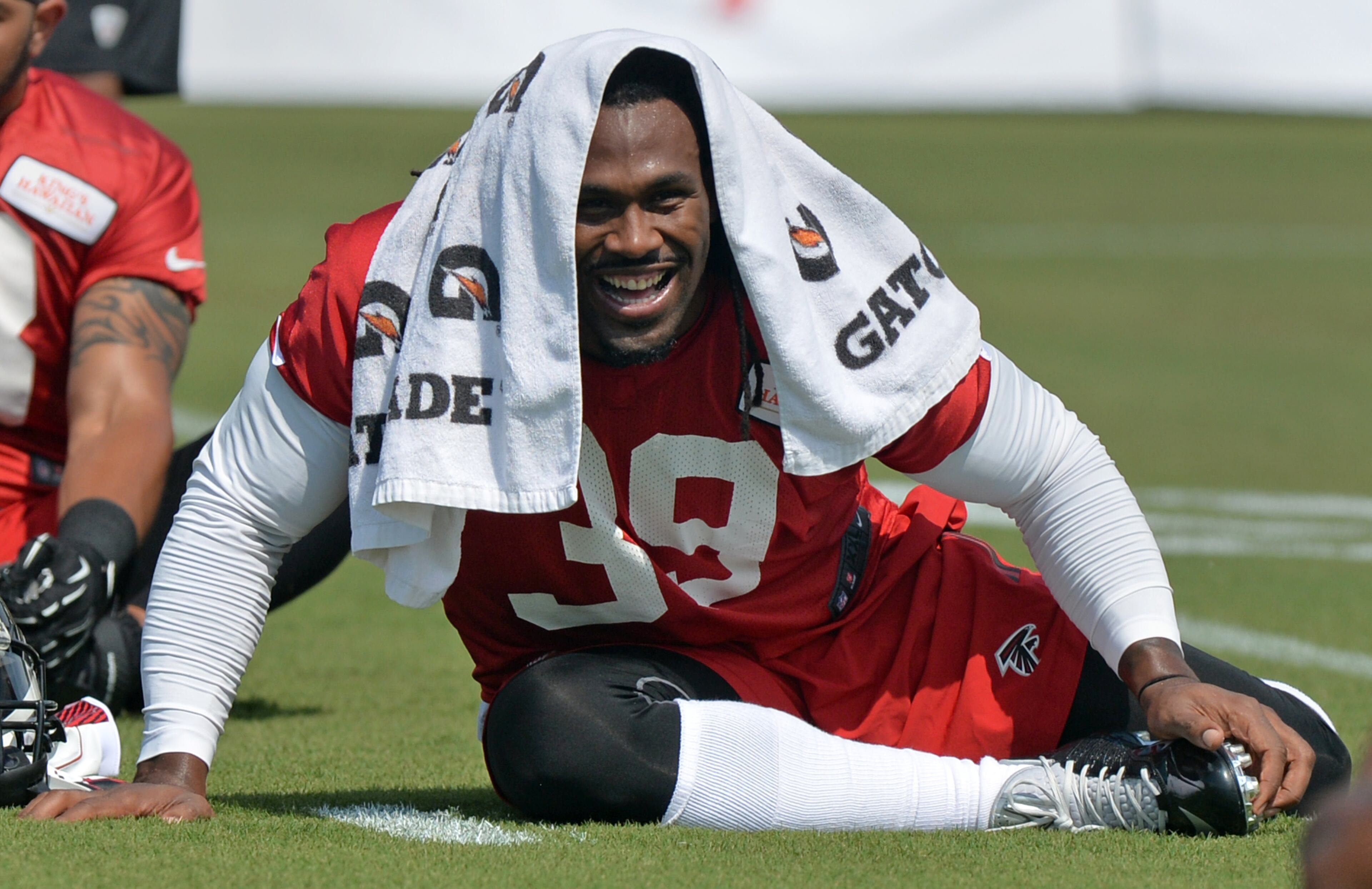 Atlanta Falcons running back Steven Jackson stretches during training camp on Friday, July 25, 2014.