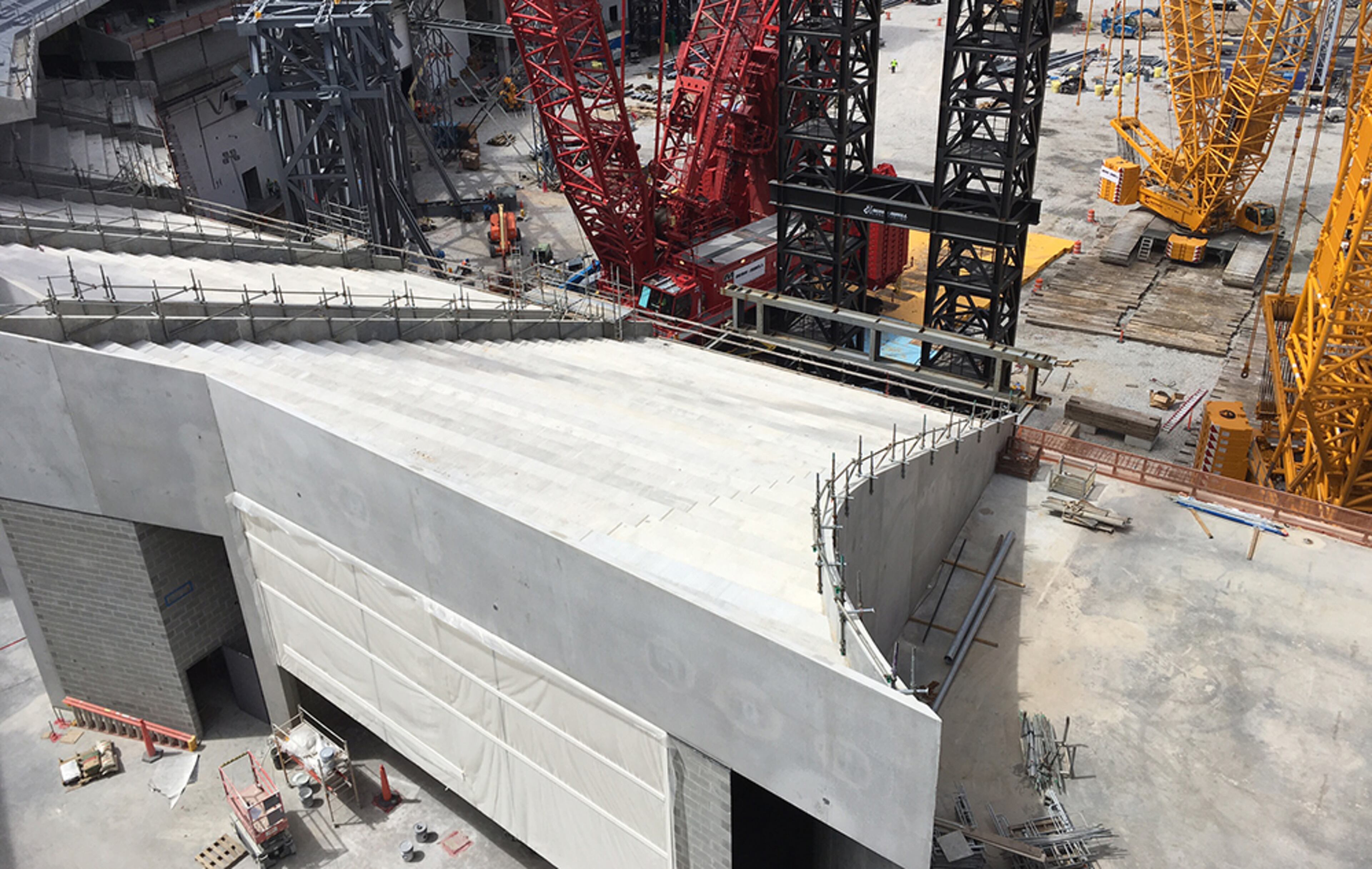 The supporters end. This end of the stadium, which will be closest to the large clear wall that will enable views of the Atlanta skyline, is partially finished. The lower bowl hasn’t been completed because of the cranes. The red crane is one of only two in the world.
