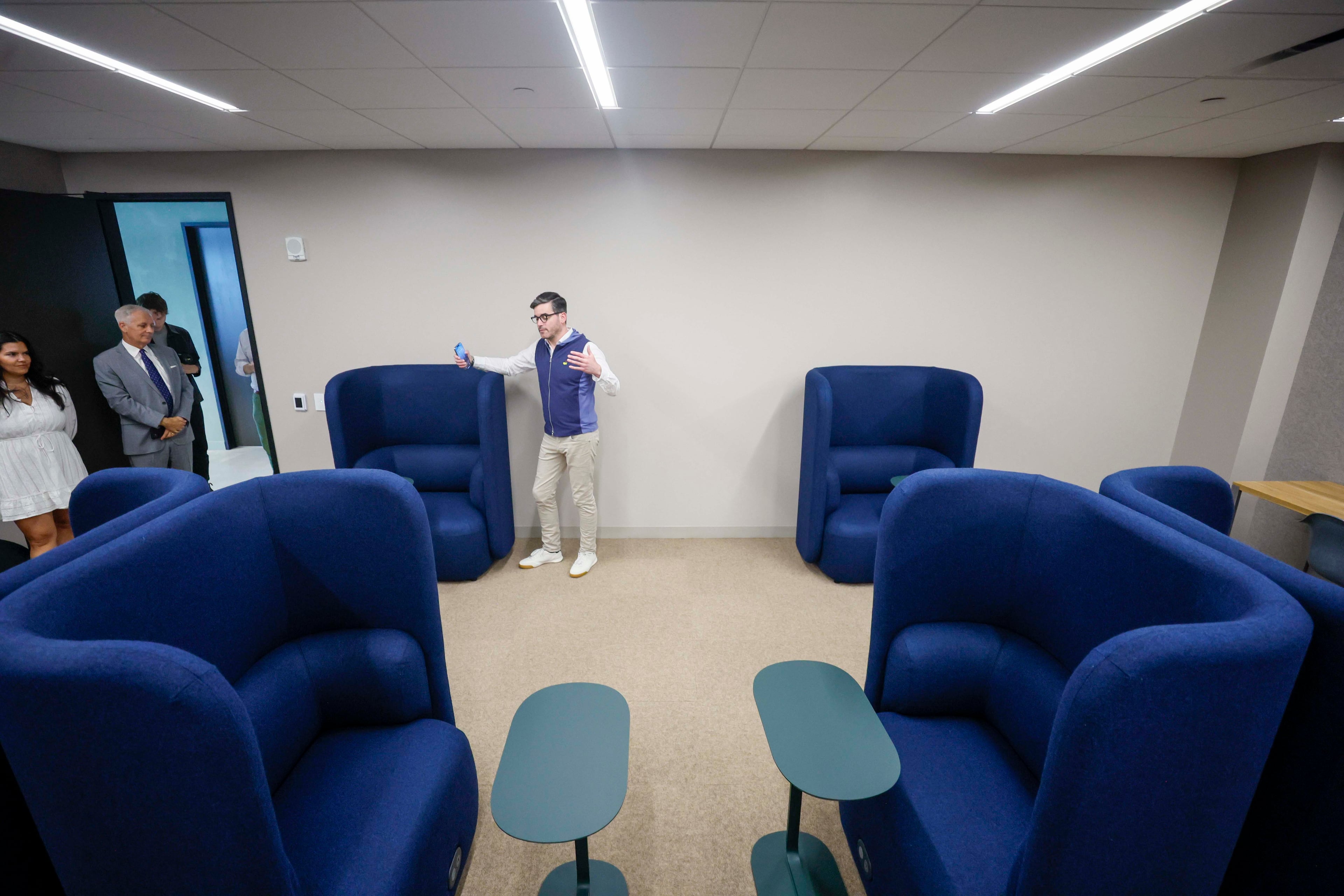 Garrett Page, Director of Commercial and Workplace Operations at Rivian, explains the features of the Deep Focus Room during a tour of Rivian’s new East Coast headquarters in Atlanta on Tuesday, August 4, 2026. (Miguel Martinez/AJC)