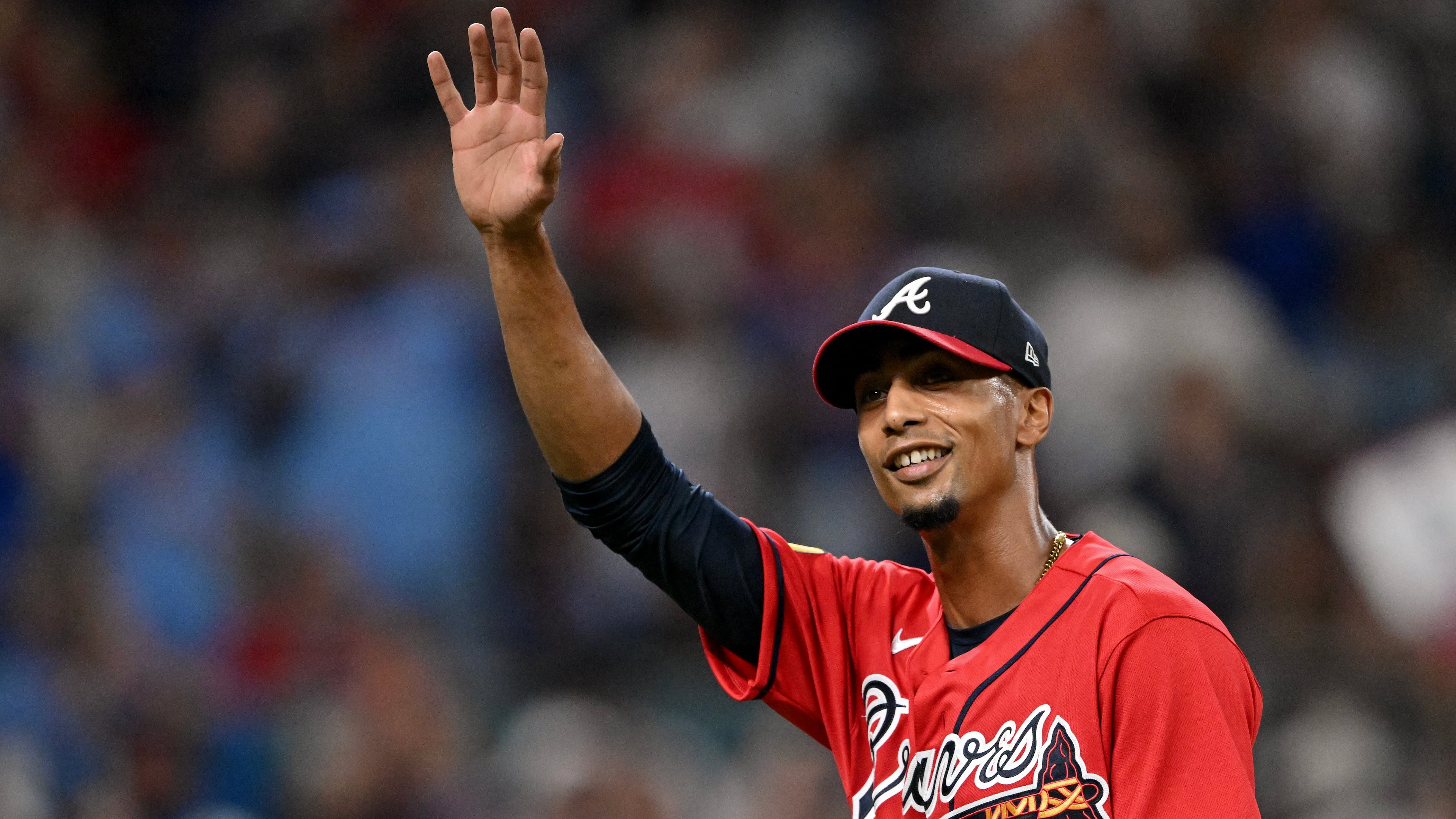 Braves pitcher Ray Kerr acknowledges the Truist Park crowd after being relieved during Game 3 of their NL Wild Card Series against the Phillies on Thursday, Oct. 1, 2026, in Atlanta. Kerr had only appeared in 48 MLB games before Thursday, and only nine this season. (Hyosub Shin/AJC)