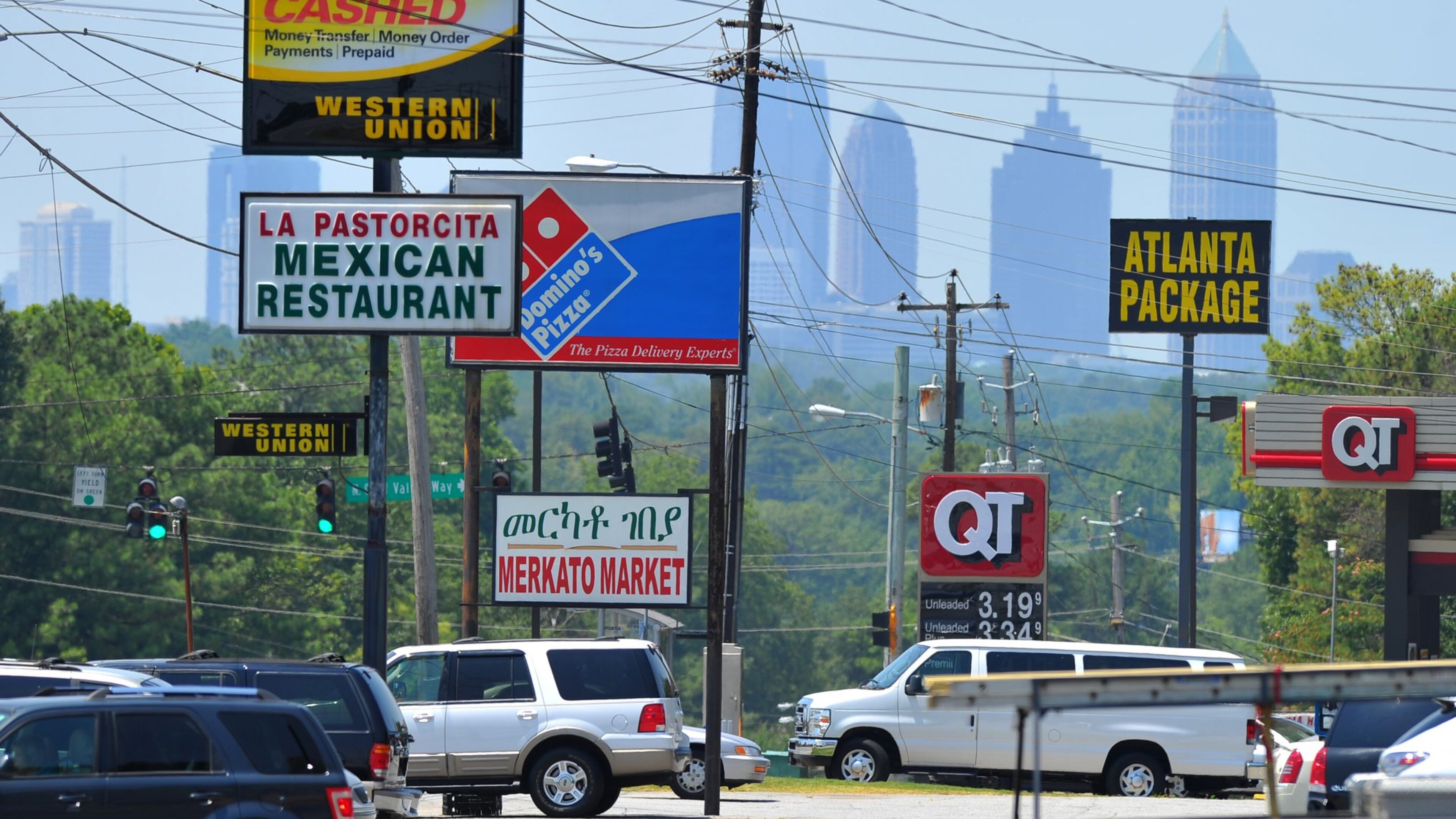 The city of Brookhaven includes tidy homes with manicured lawns, some costing millions of dollars, and businesses along gritty Buford Highway, pictured. But what is there for tourists?
