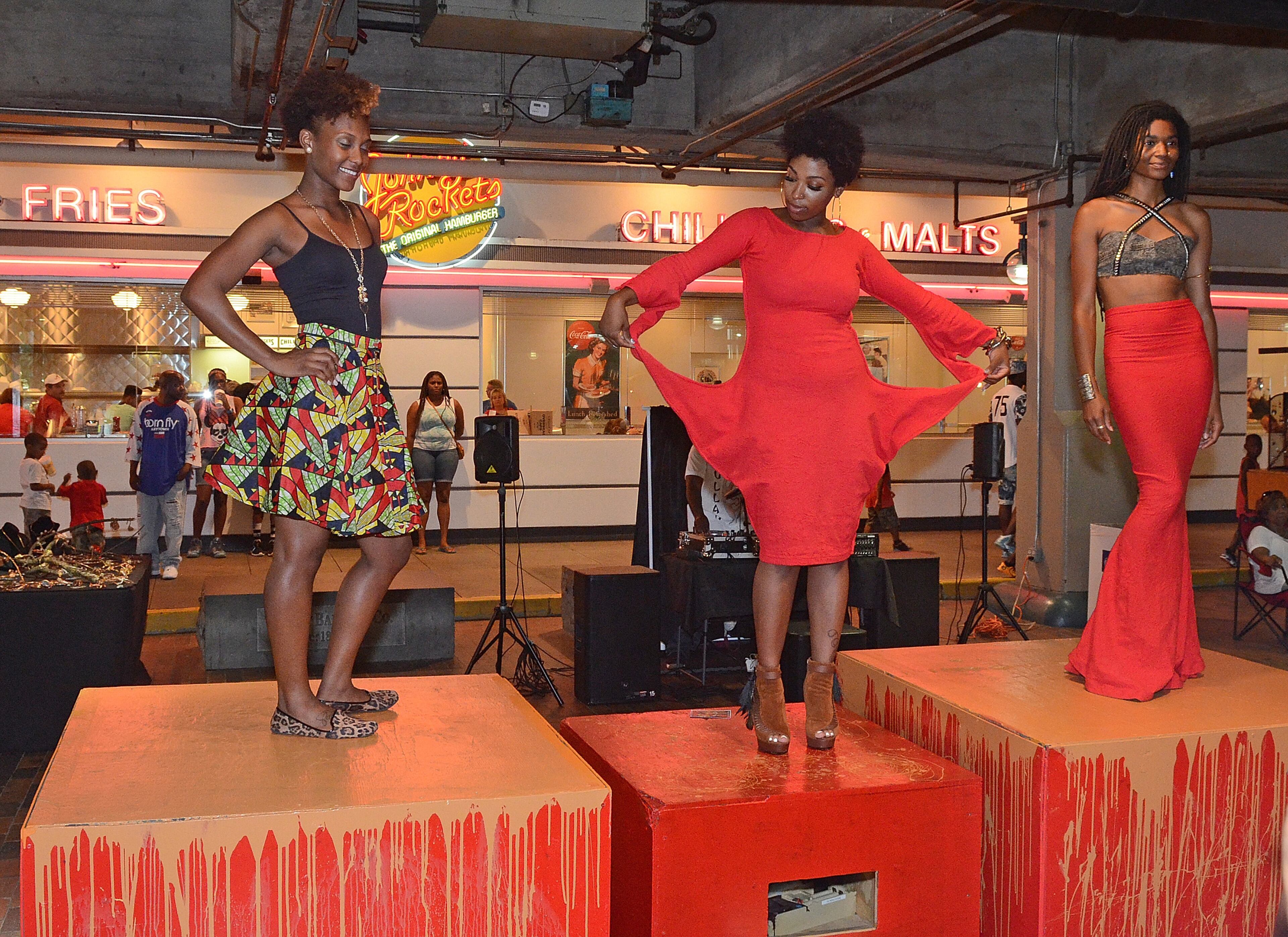 Live fashion shows in the Wearable Art district go on through the event in Underground Atlanta at 19th Annual Heritage Arts and Soul Festival at Underground Atlanta. The event features the work of over 30 artist, featuring fine art and wearable art ,plus an emerging artist pavillion, fashion show. (CHRIS HUNT/SPECIAL)