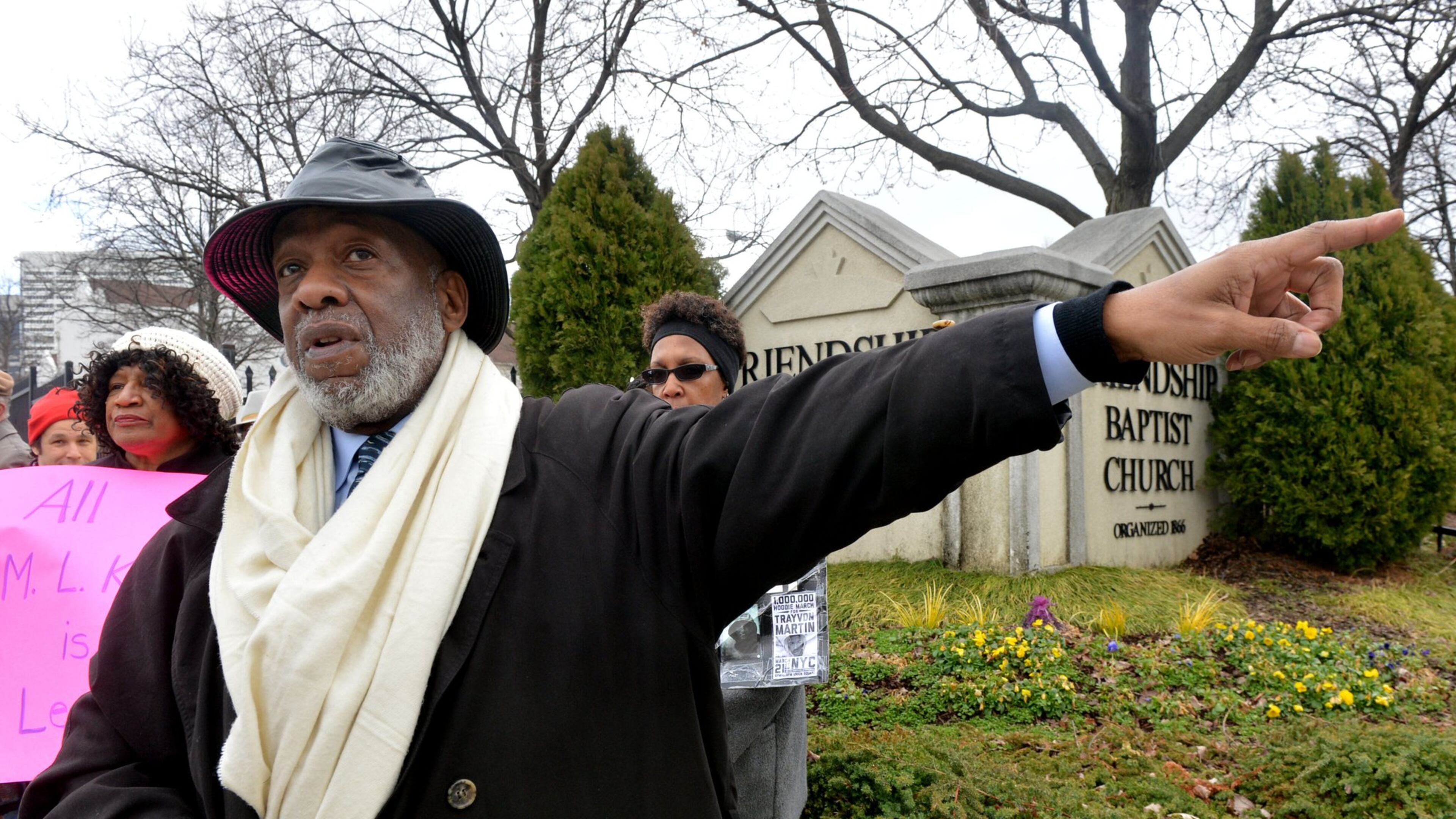 Bishop John Lewis (right), president of the Westside Neighborhoods Coalition joined other members of the Westside Neighborhoods Coalition at a press conference and rally at the corner of MLK Drive and Northside Drive Wednesday, February 5, 2014. Construction around the future Atlanta Falcons stadium has begun, with traffic being detoured around Martin Luther King Drive. Residents there are frustrated and confused about plans to reroute the hallmark roadway, which mayor Kasim Reed has pledged to make the most prominent MLK Drive in the nation. Council members are asking Reed’s administration for detailed plans about how the road will be re-routed, but so far, none have been given. KENT D JOHNSON/KDJOHNSON@AJC.COM