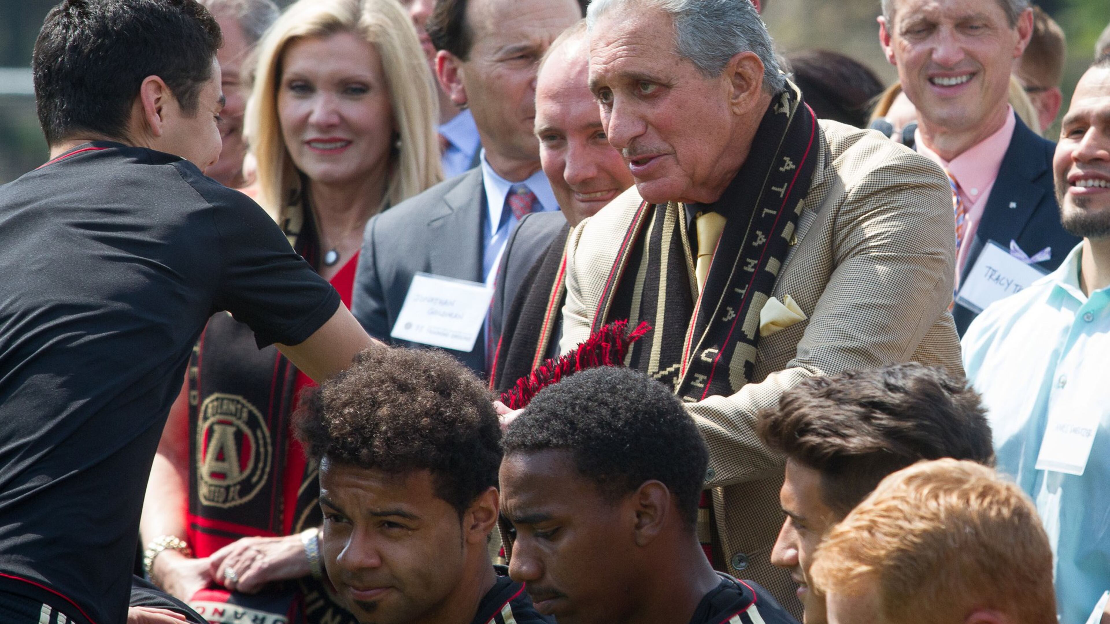 Atlanta United Owner and Chairman Arthur Blank shakes hands with one of the Atlanta United soccer players after the ground breaking ceremony of the Children’s Healthcare of Atlanta Training Ground in Marietta GA Tuesday 11, 2017. STEVE SCHAEFER / SPECIAL TO THE AJC