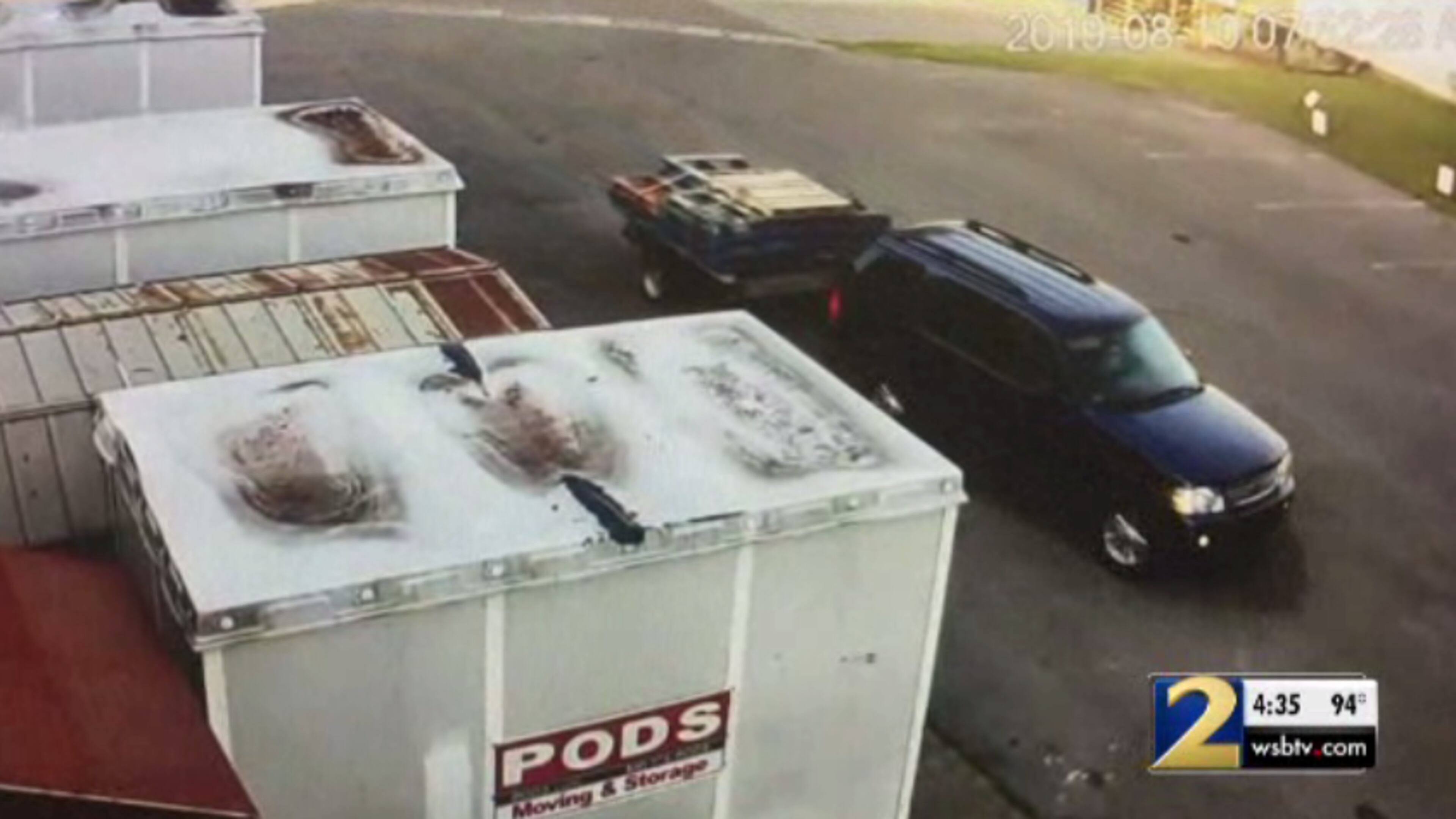 Two people are accused of getting out of this SUV and stealing items from the Habitat for Humanity shelter in Cartersville.