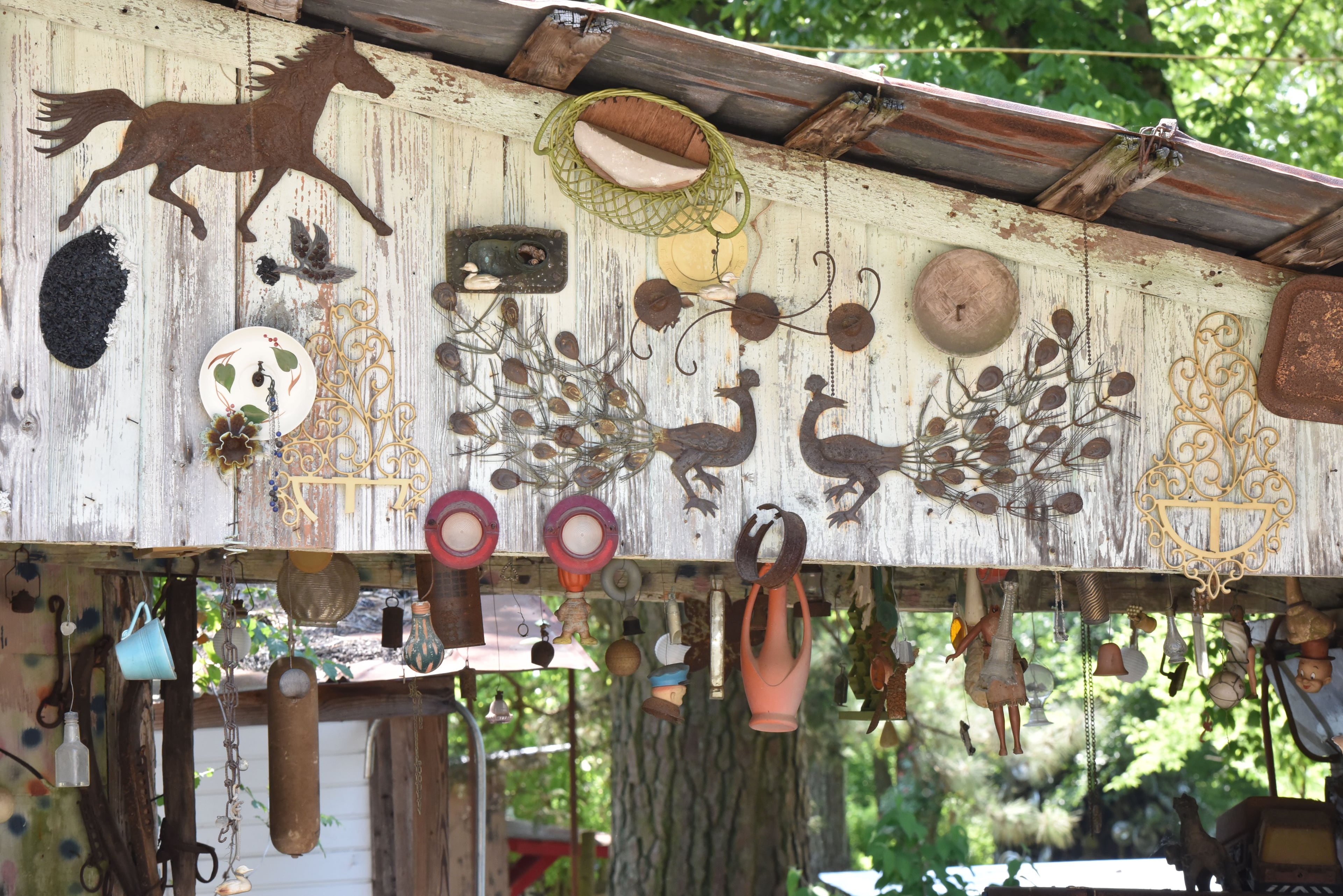 May 9, 2015 Summerville - Picture shows folk artist Howard Finster's Paradise Garden in Summerville on Saturday, May 9, 2015. Famous folk artist Howard Finster began creating Paradise Gardens in 1961. It is listed as one of Georgia's noted art attractions. Finster's outsider art -- sculpture and paintings -- draws tourists from around the world. In advance of Finster Fest, May 30-31 in the northwest Georgia town of Summerville. Georgia's most famed folk artist, Finster was known as a great American eccentric, and plenty of eccentric places survive him in this gritty corner of the state. HYOSUB SHIN / HSHIN@AJC.COM