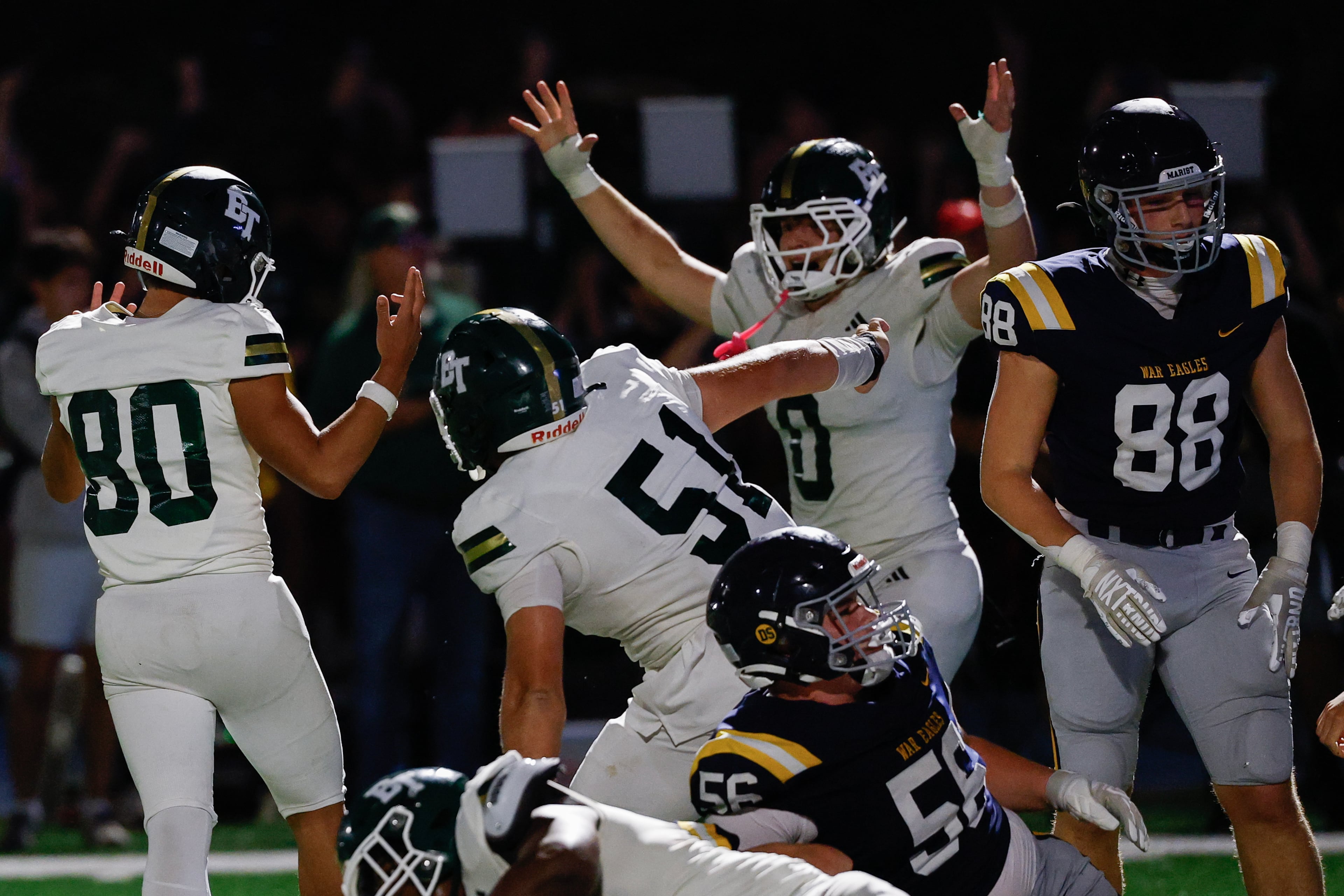 Blessed Trinity’s Richard Morthland (left) celebrates after kicking the game-winning field goal against Marist on Friday, Sept. 25, 2026, in Atlanta. (Erik S. Lesser for the AJC)