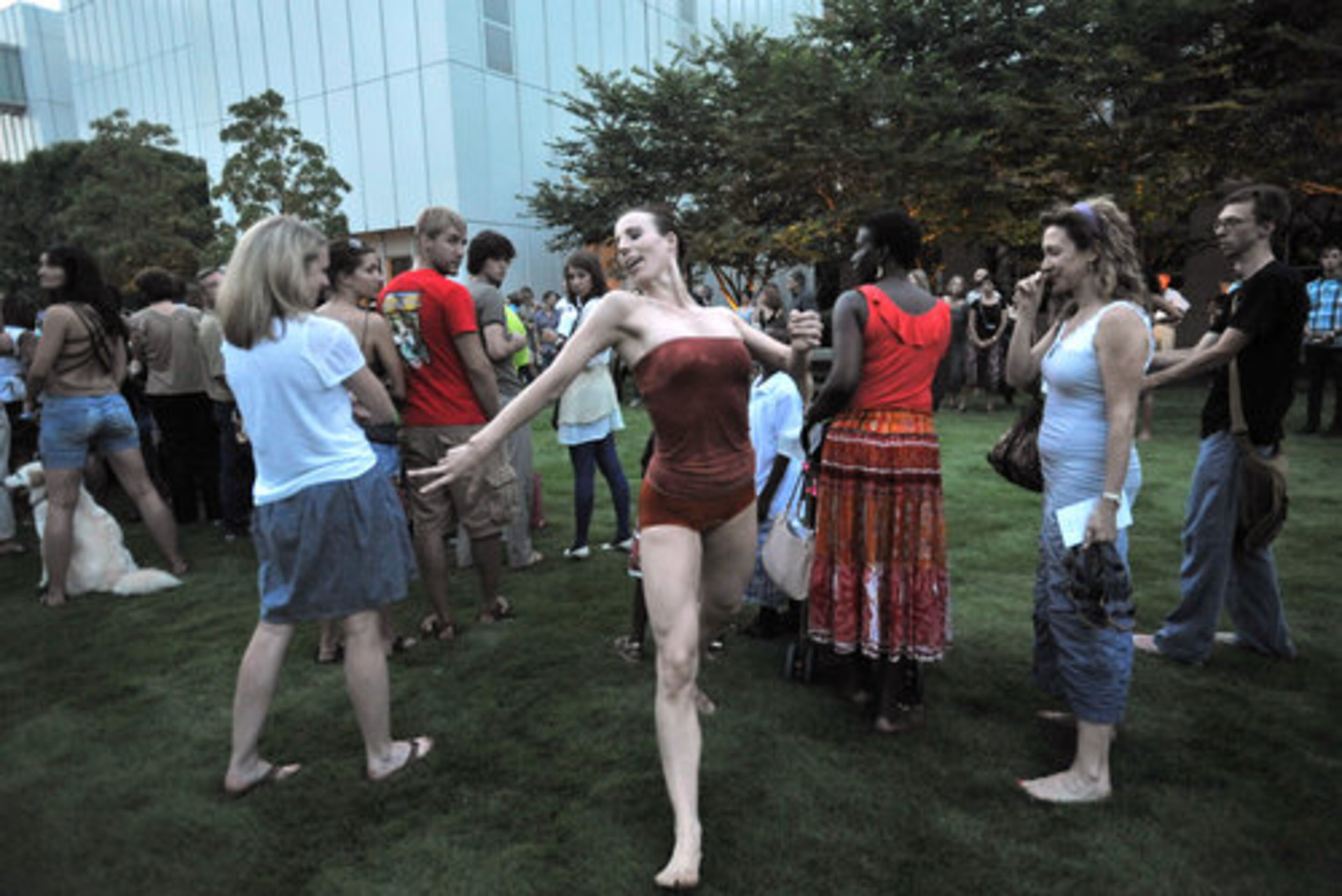 An artist performs "Sculpting Ground" during Roem.