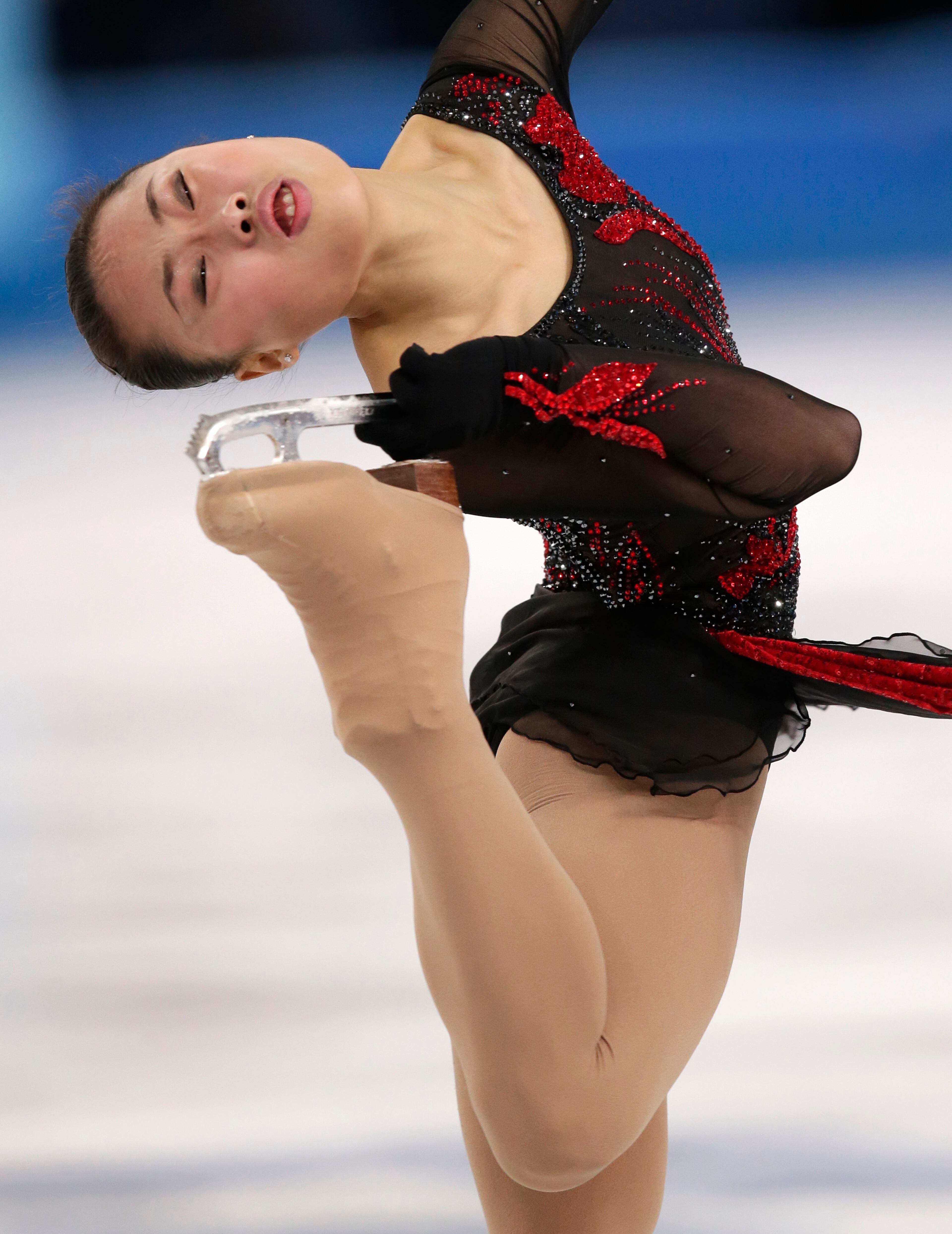 Zhang Kexin of China competes in the women's free skate figure skating finals at the Iceberg Skating Palace during the 2014 Winter Olympics, Thursday, Feb. 20, 2014, in Sochi, Russia. (AP Photo/Bernat Armangue)