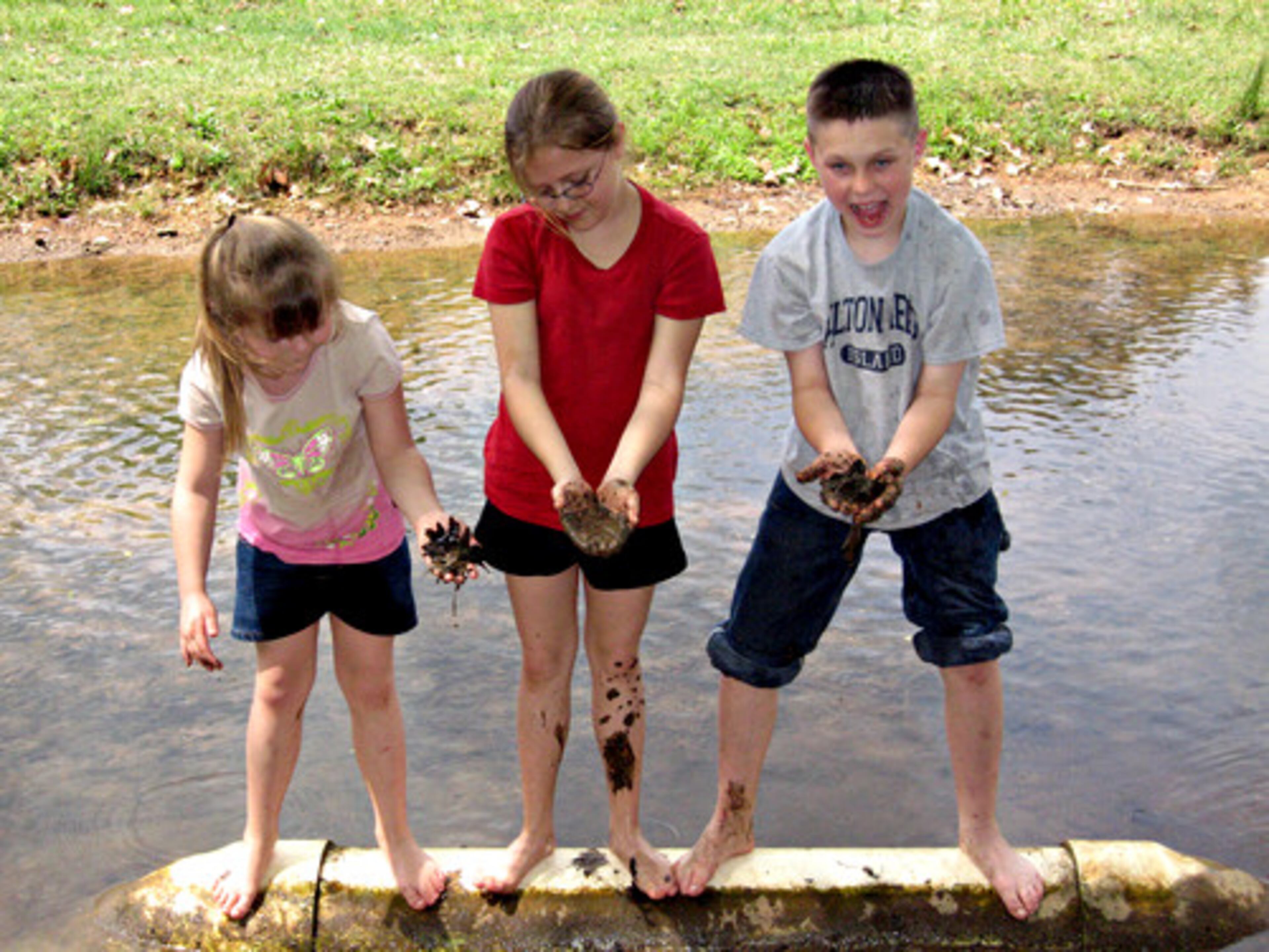 Olivia, Bailee and Kaleb in the mud at Cave Springs, Ga., on Jan. 26.