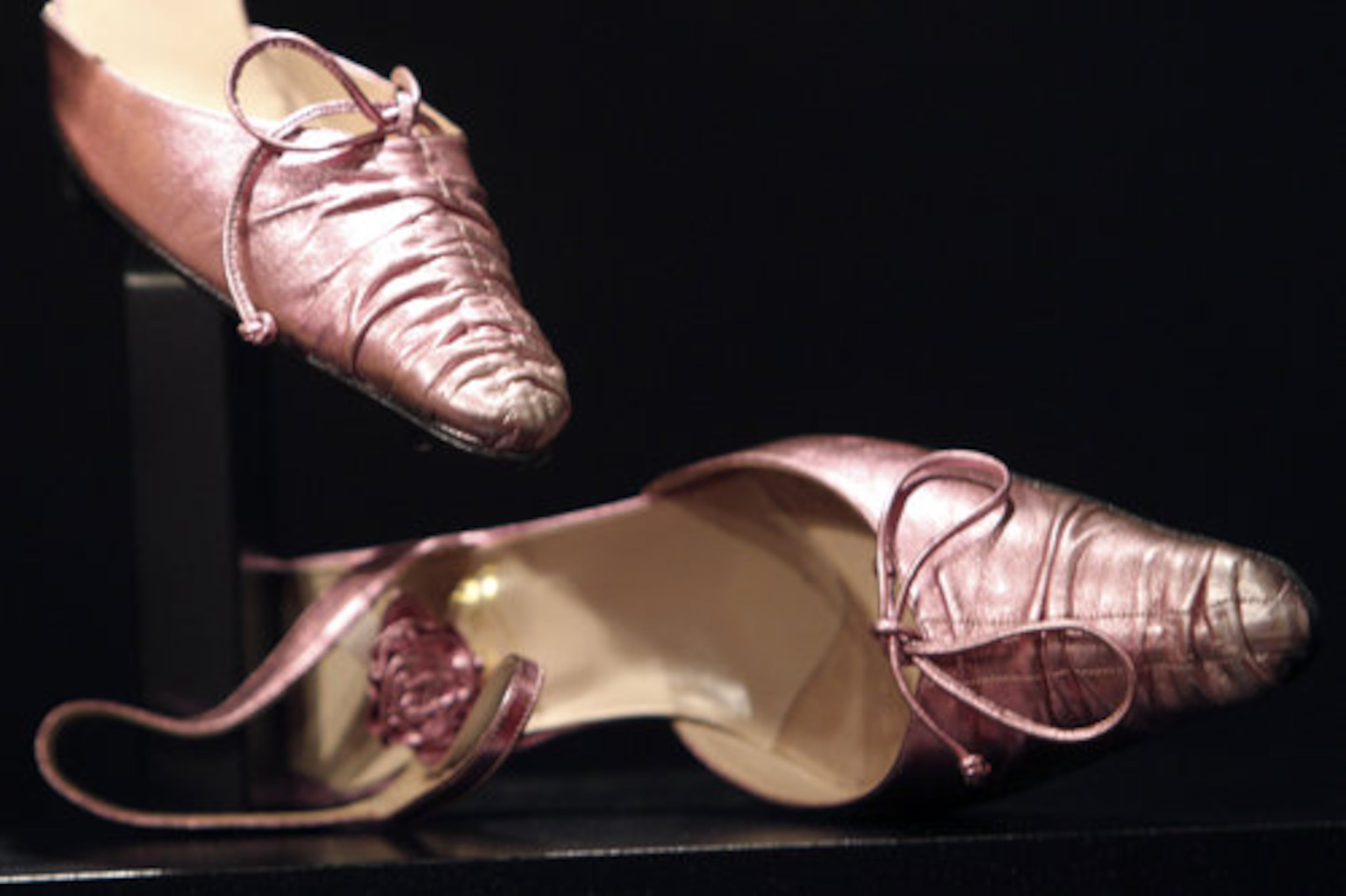 Pink heels once worn by Taylor will be for sale in the auction.