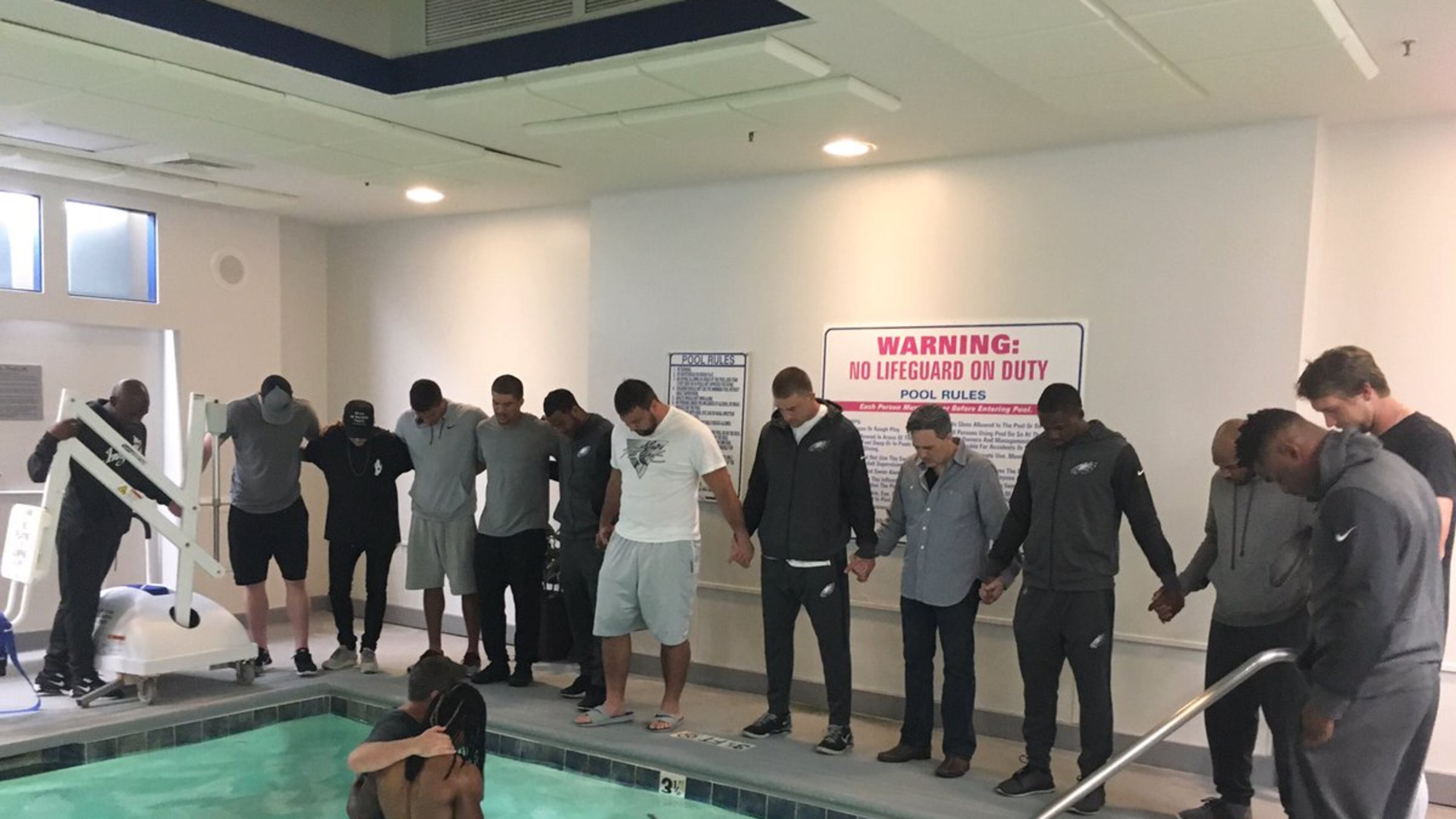 Philadelphia Eagles wide receiver Marcus Johnson was baptized in a pool before Thursday night's game against the Carolina Panthers.