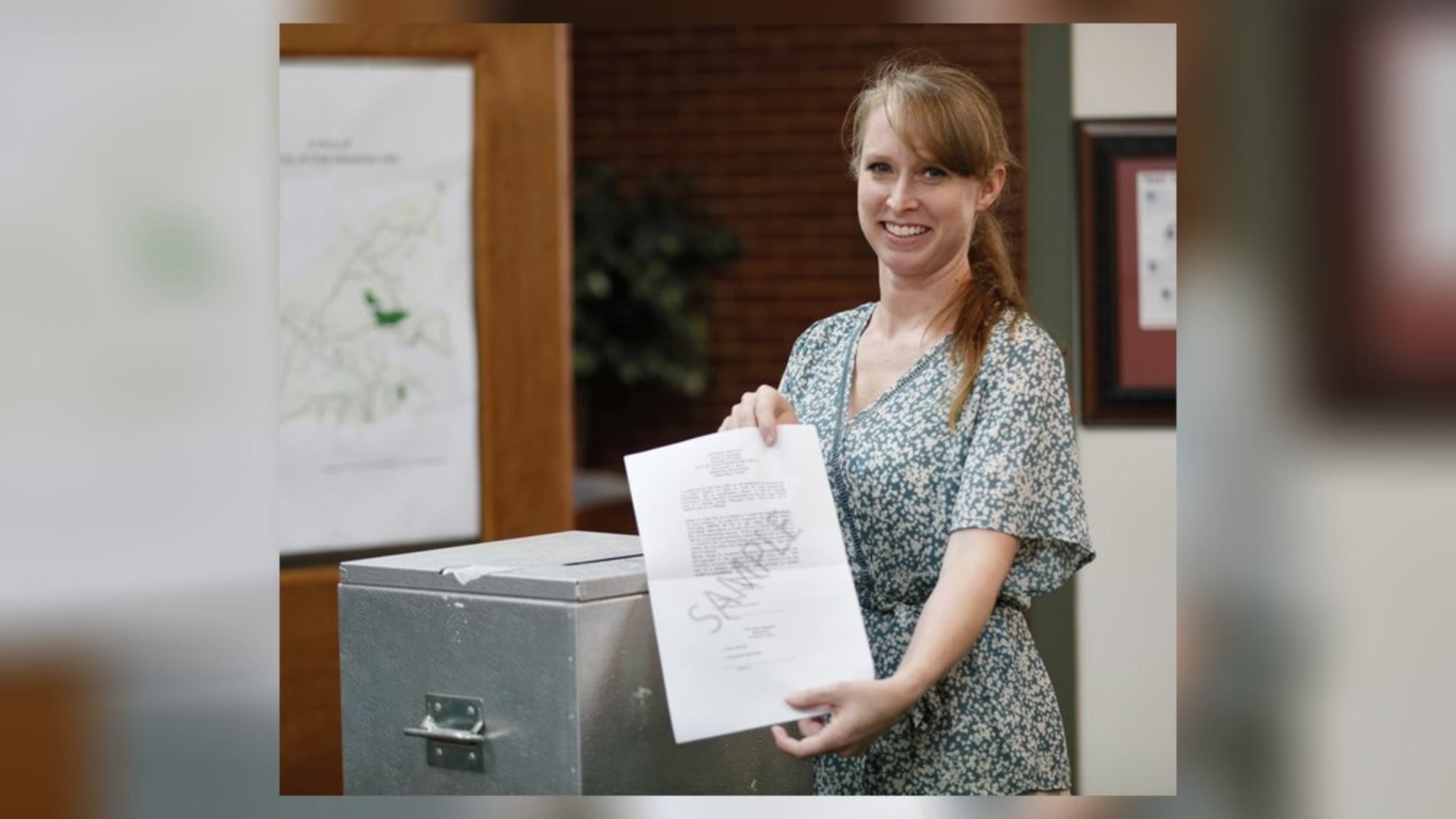 August 29, 2019, 2019 - Chattahoochee Hills - Dana Wicher with a sample ballot of the type used in their city elections, along with their ballot box. She is the city clerk and is in charge of elections in Chattahoochee Hills, a city that formed in 2007 and uses paper ballots as a cost-saving measure. Bob Andres / robert.andres@ajc.com