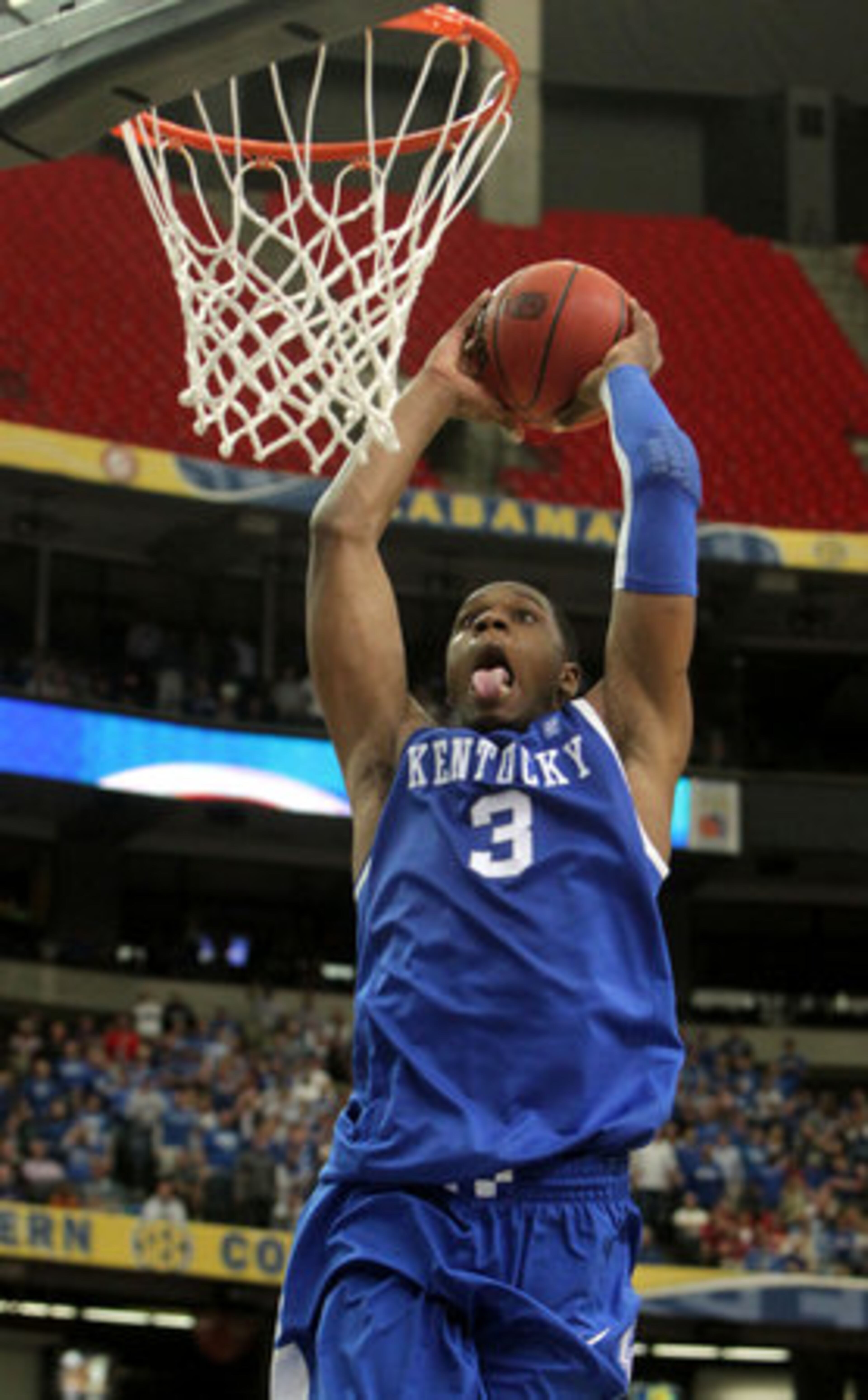 Kentucky's Terrence Jones goes for a dunk in the Wildcats' 72-58 win over Alabama in an SEC tournament semifinal at the Georgia Dome on Saturday afternoon.