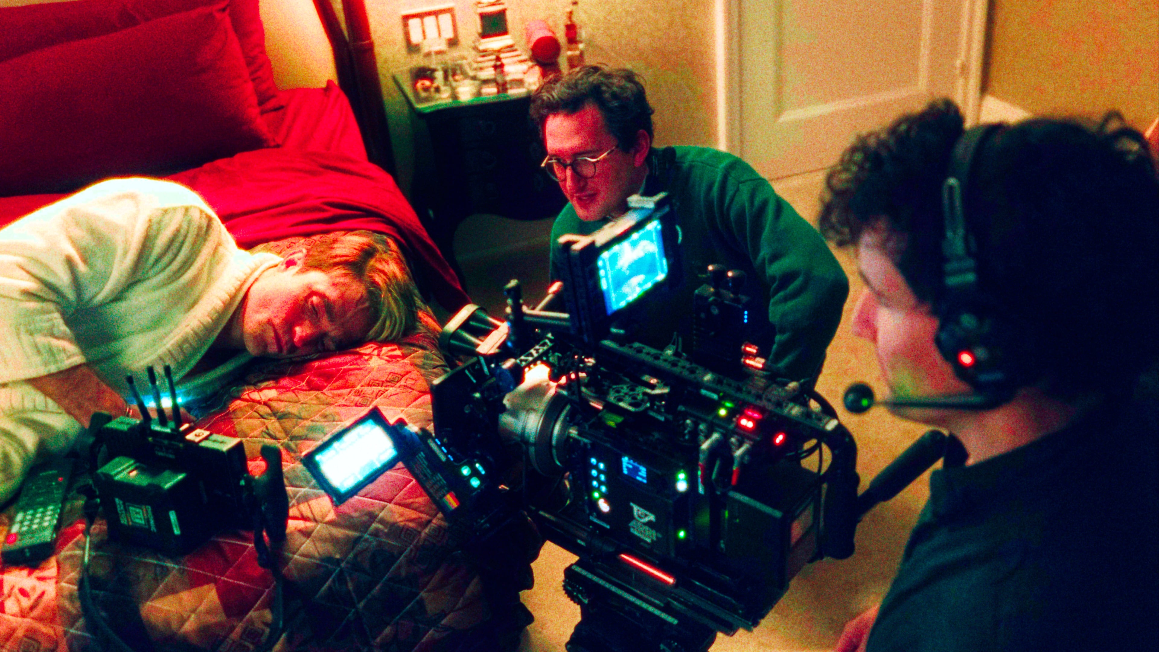 This image released by A24 shows Robert Pattinson, from left, director Lance Oppenheim, and cinematographer David Bolen during the filming of "Primetime." (A24 via AP)