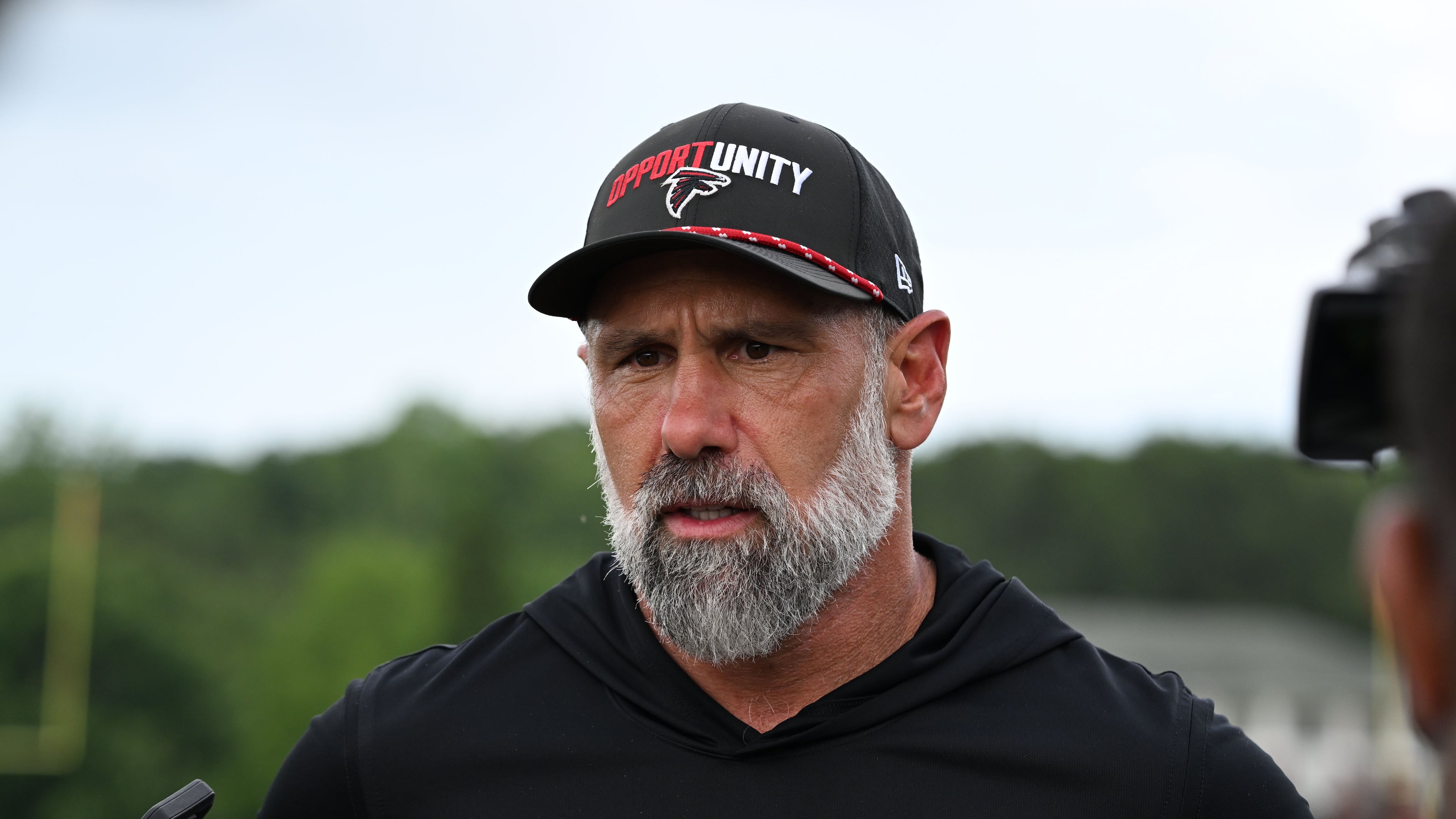 Atlanta Falcons defensive coordinator Jeff Ulbrich speaks to the media during a news conference at the Atlanta Falcons training facility on Wednesday, May 27, 2026, in Flowery Branch. (Hyosub Shin/AJC)