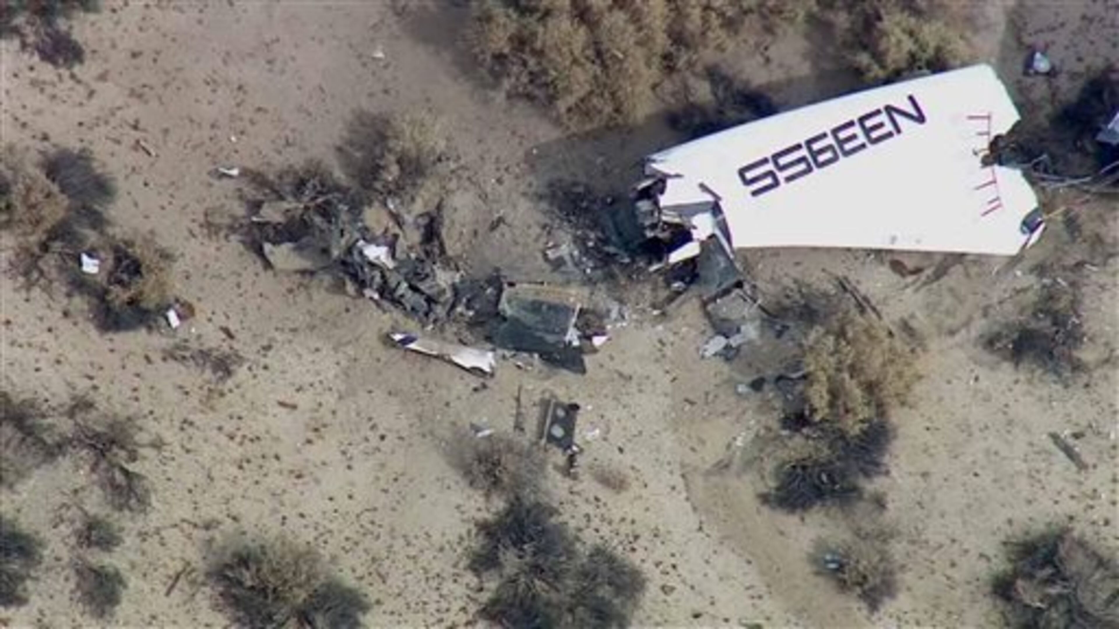 This image from video by KABC TV Los Angeles shows wreckage of what is believed to be SpaceShipTwo in Southern California's Mojave Desert on Friday, Oct. 31, 2014. A Virgin Galactic space tourism rocket exploded after taking off on a test flight, a witness said Friday. (AP Photo/KABC TV)