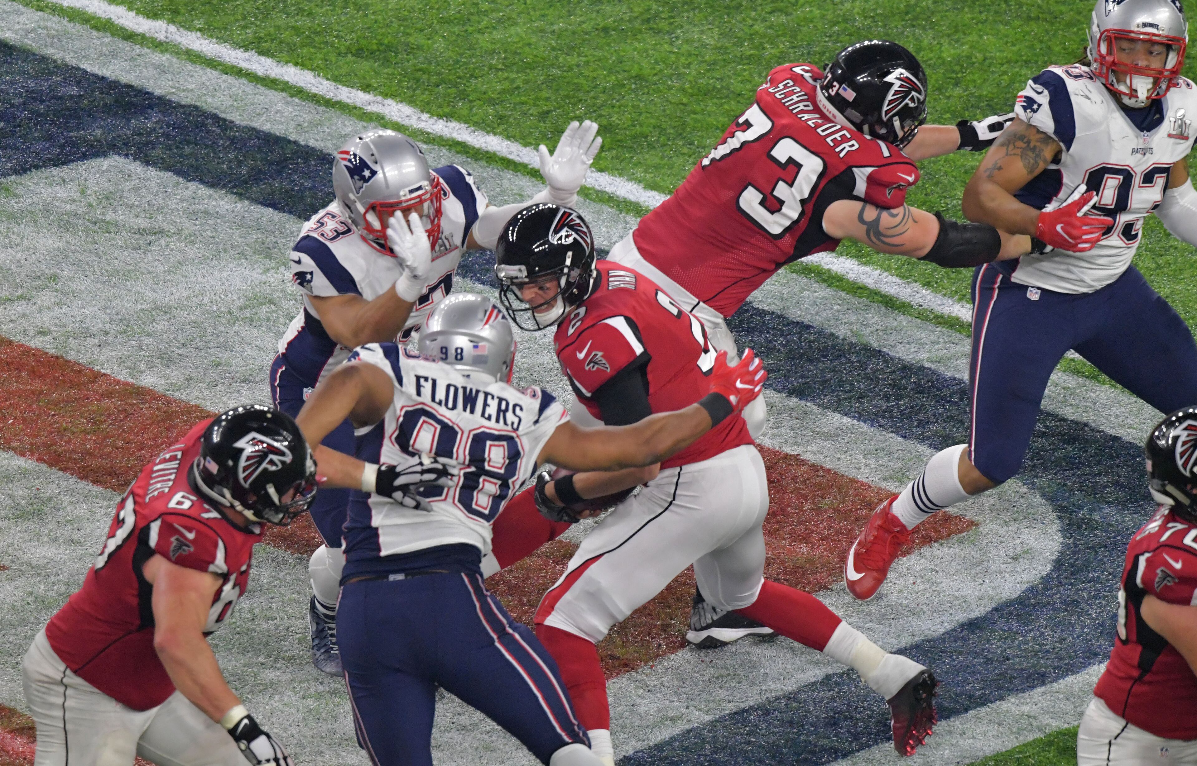 February 5, 2017 Houston, TX - Atlanta Falcons quarterback Matt Ryan (2) is sacked by New England Patriots outside linebacker Kyle Van Noy (53) and New England Patriots defensive end Trey Flowers (98) in the fourth quarter at NRG Stadium in Houston, TX, on Sunday, February 5, 2017. HYOSUB SHIN / HSHIN@AJC.COM