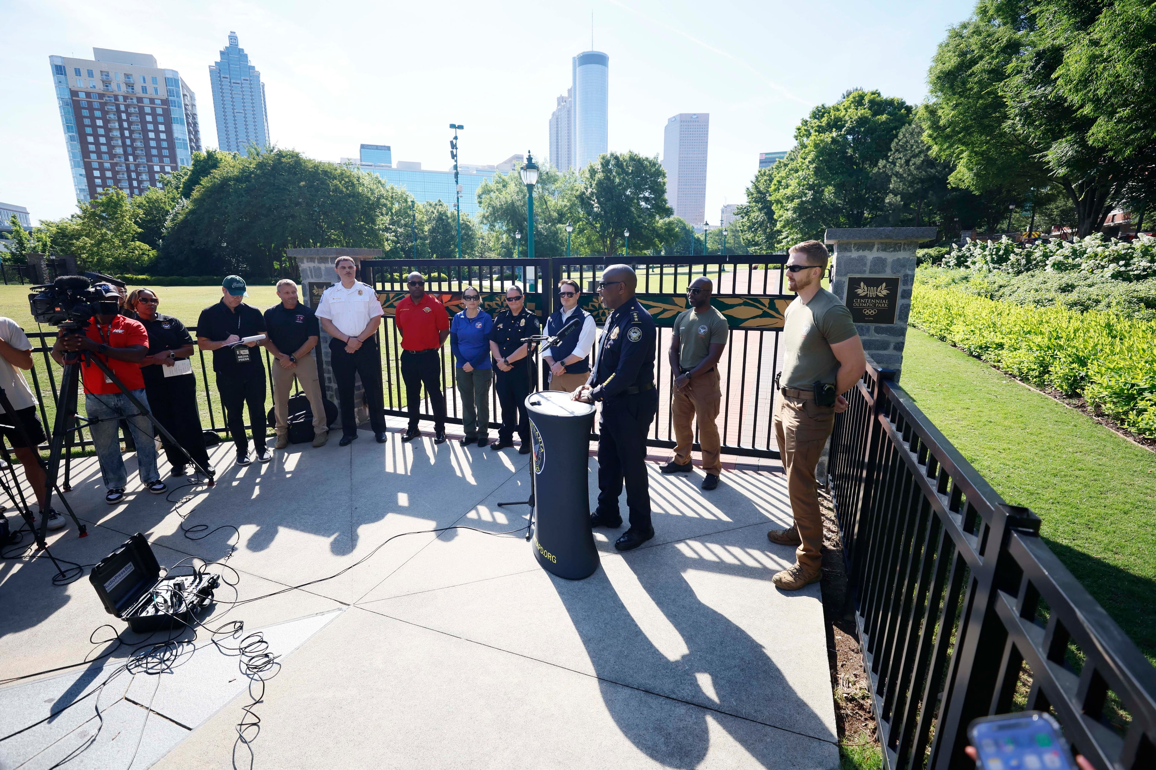 APD Assistant Chief Carven Tyus, along with local partners, addresses the press as they prepare for a mass casualty training at Centennial Olympic Park on Monday, May 4, 2026, ahead of the World Cup. (Miguel Martinez/AJC)