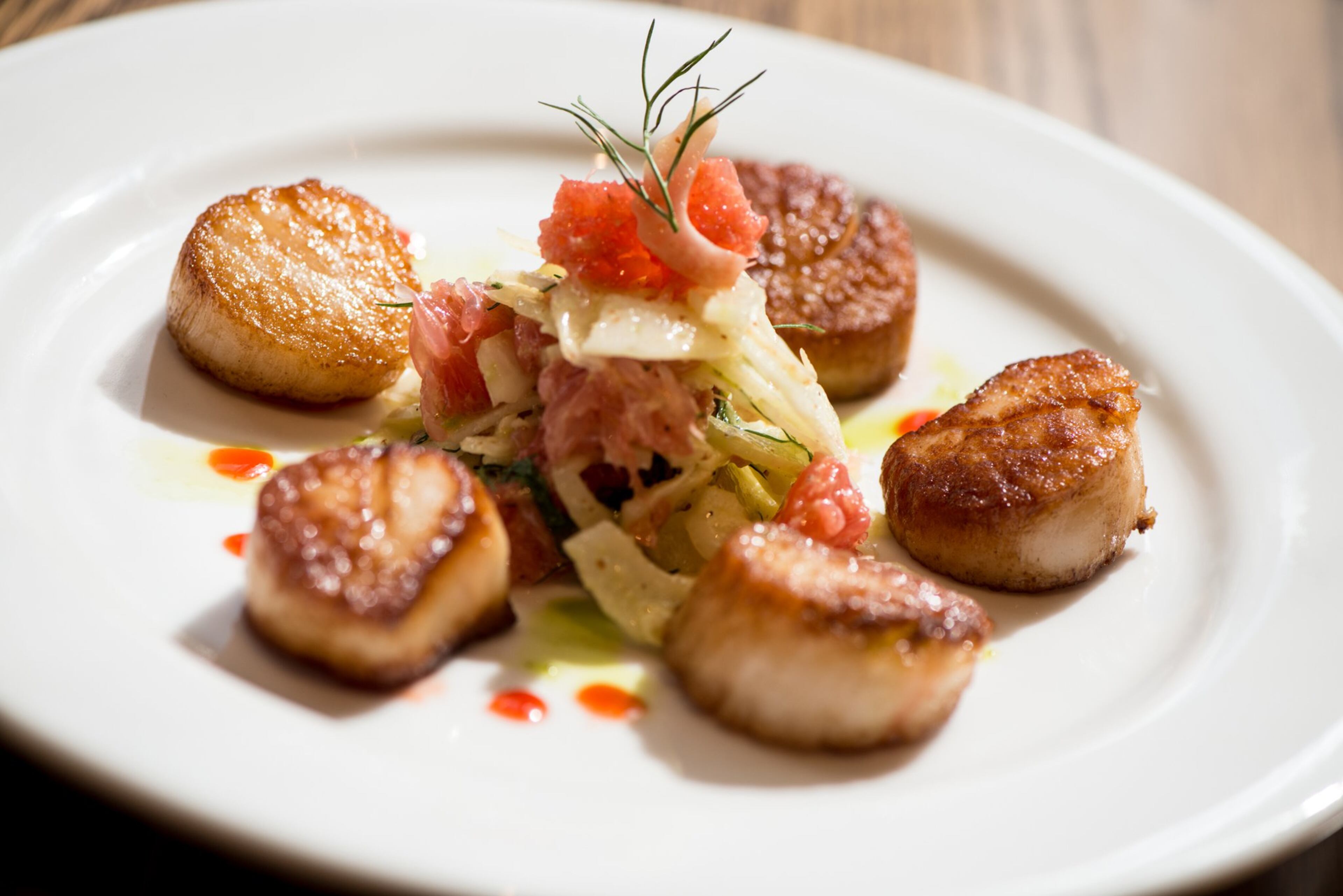 Mediterranea pan-seared scallops with fennel and grapefruit. Photo credit- Mia Yakel.