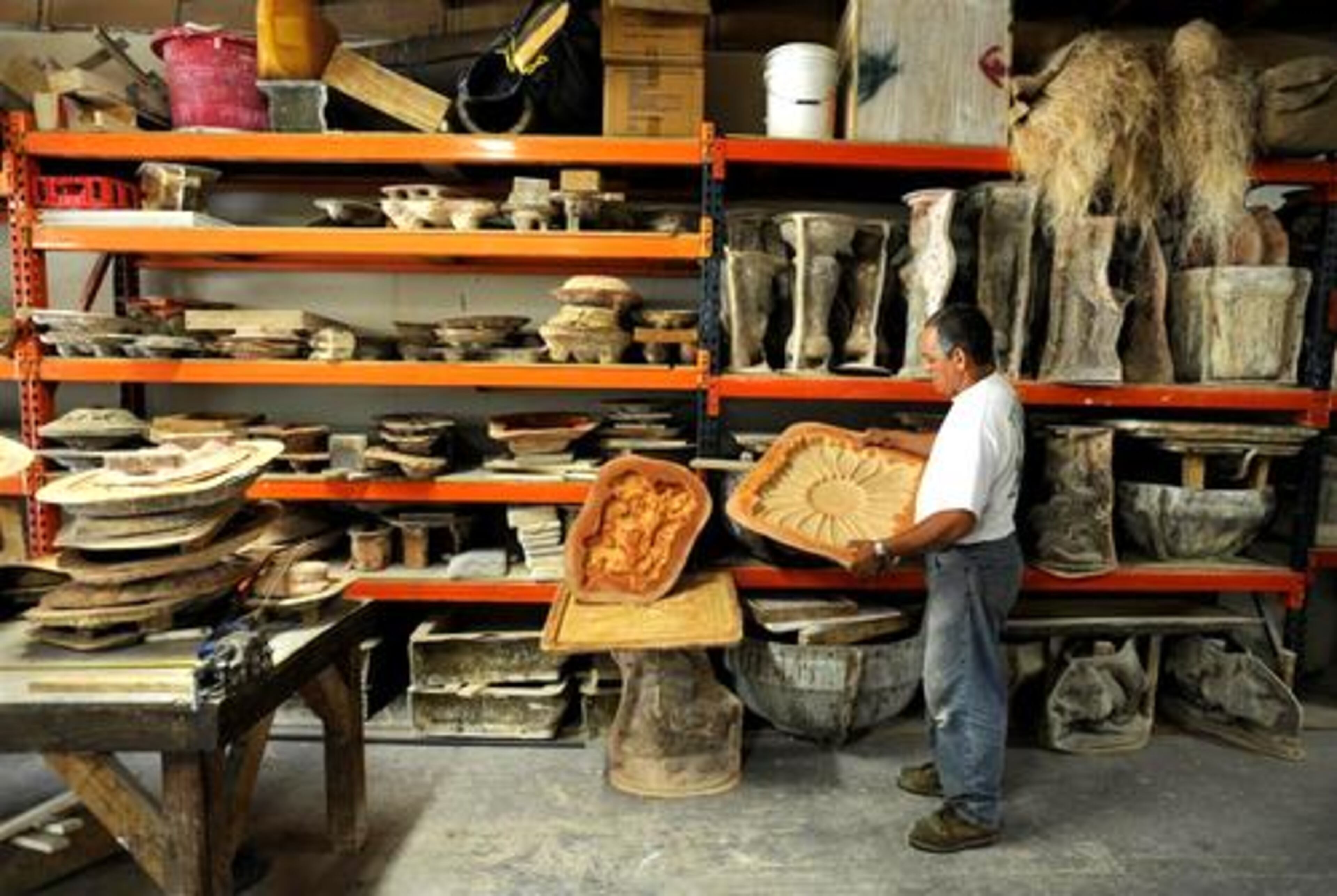 At Casa Montano in Fairburn, Ga., Montano uses molds of select pieces to re-create Christine Sibley's work.