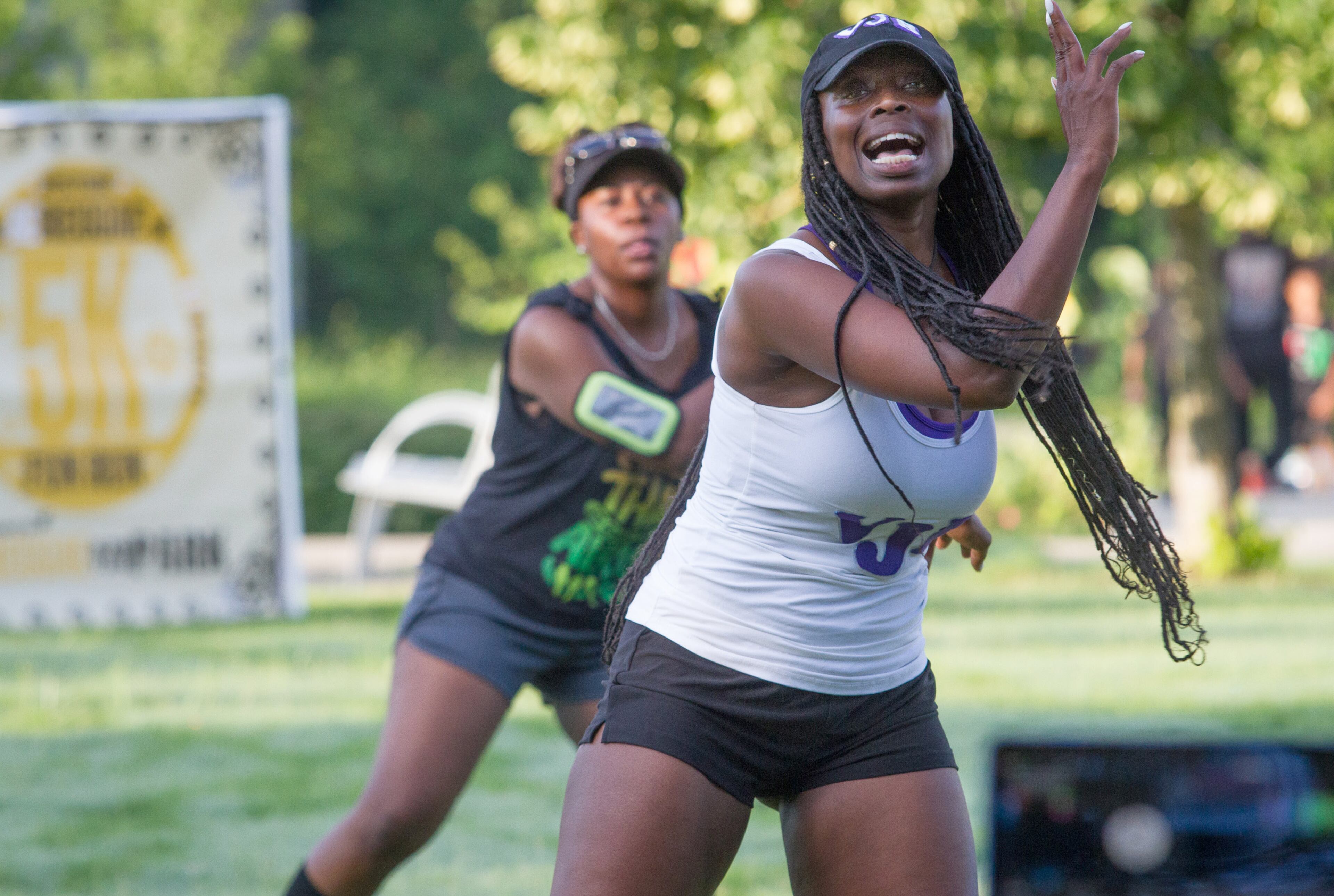 Vanessa J Barton (R) leads the runners in warm up exercises before the start of the Reggae 5K Fun Run near Gordon-White Park in the West End Neighborhood Saturday, July 7, 2018. STEVE SCHAEFER / SPECIAL TO THE AJC
