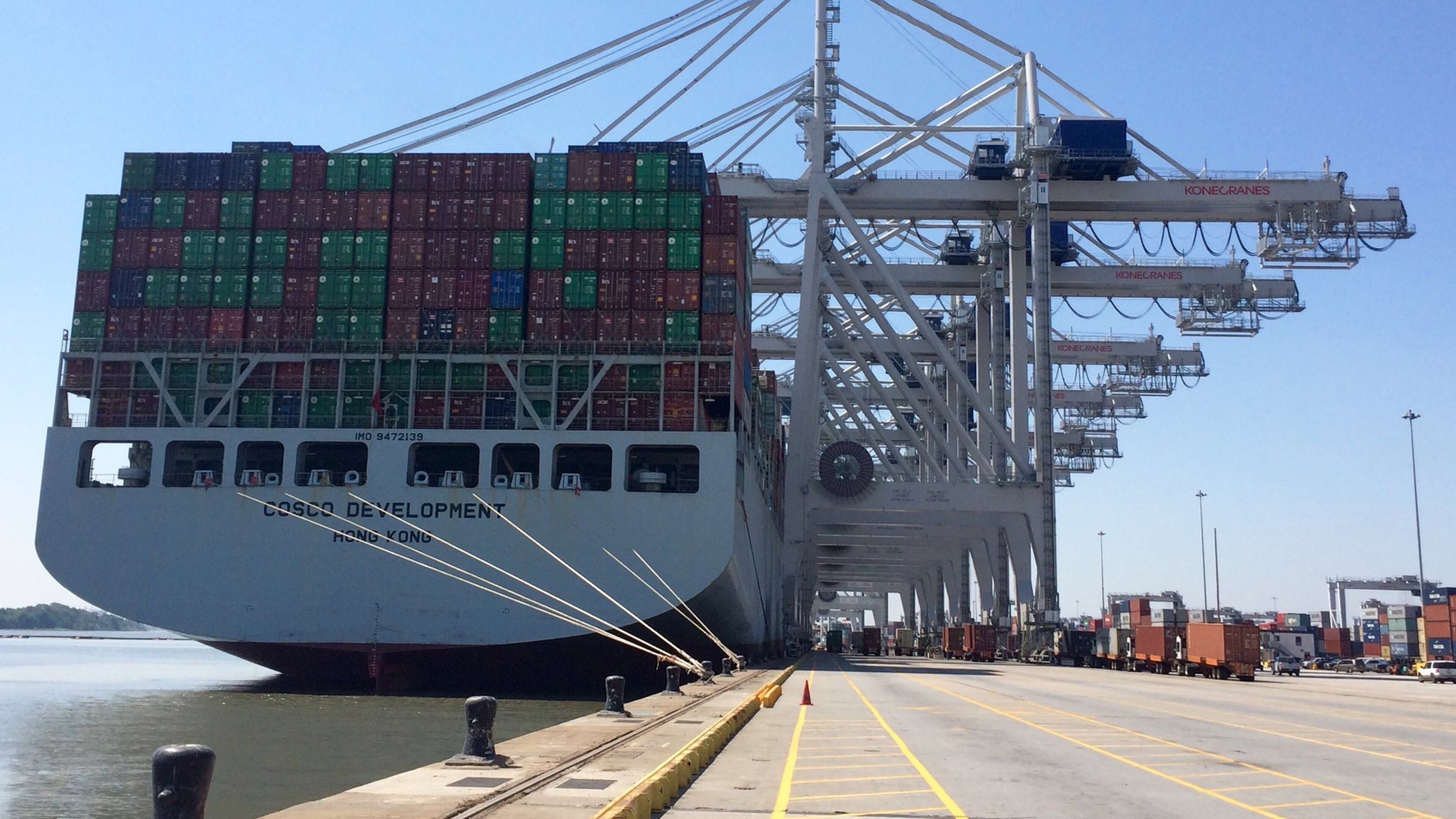 Cranes load and unload containers at the Port of Savannah from the Cosco Development, the largest container ship to ever call on an East Coast port. J. Scott Trubey/strubey@ajc.com
