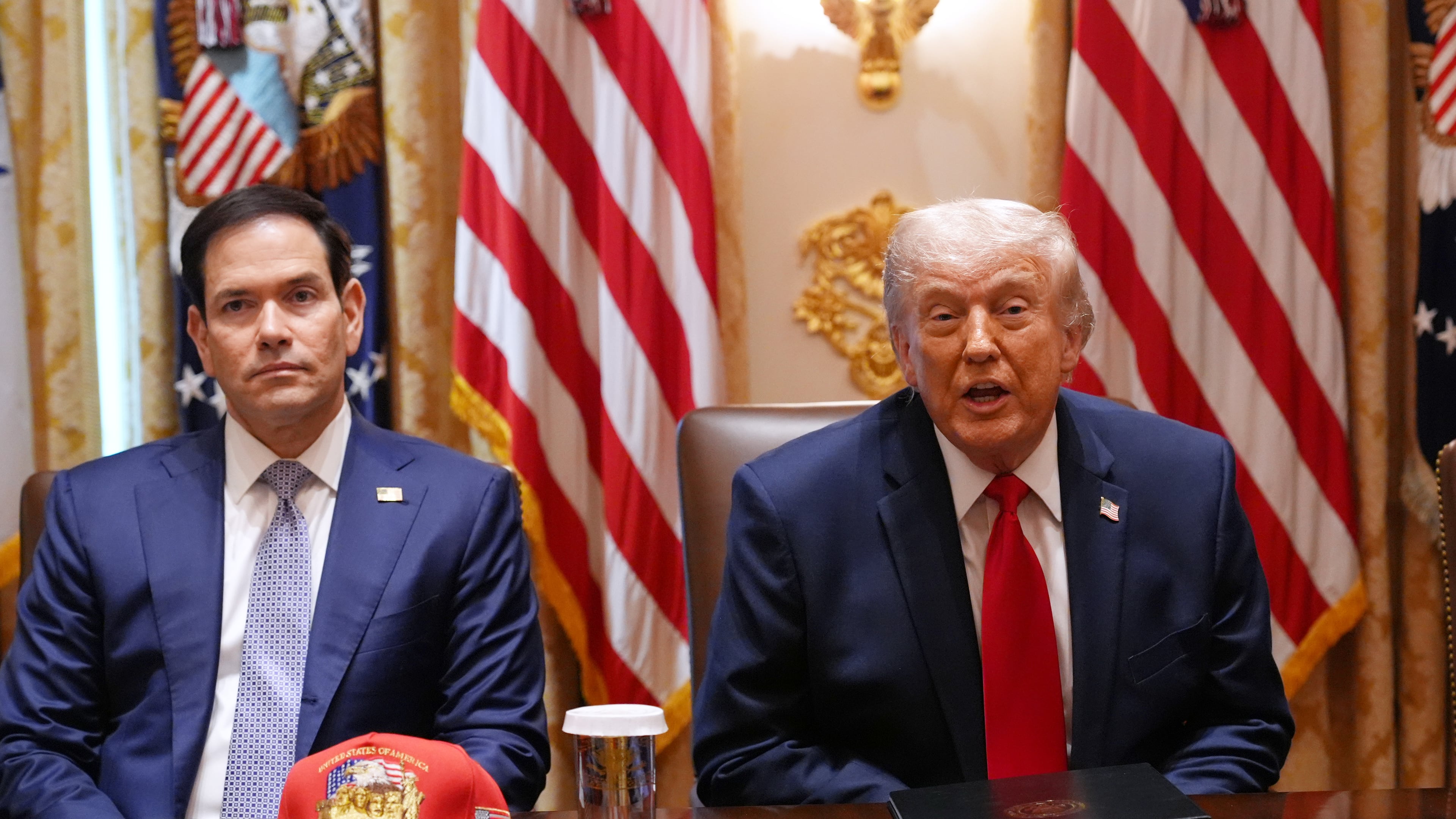 President Donald Trump, next to Secretary of State Marco Rubio, speaks during a Cabinet meeting at the White House, Wednesday, May 27, 2026, in Washington. (AP Photo/Jacquelyn Martin)