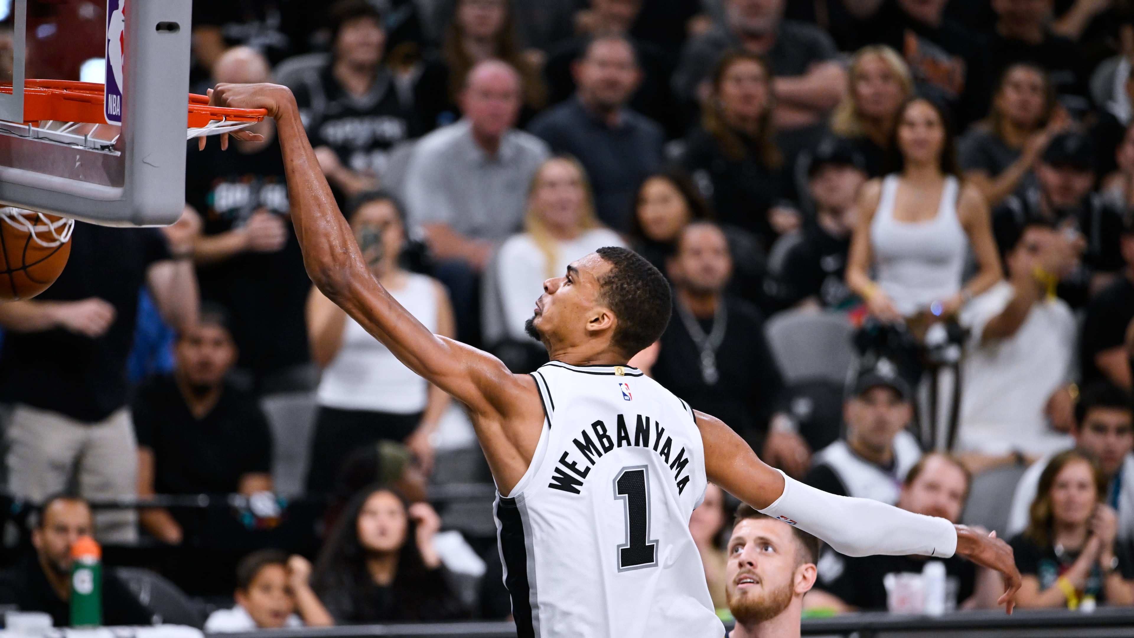 San Antonio Spurs forward Victor Wembanyama (1) scores a basket on the Oklahoma City Thunder during the second half of Game 4 in the Western Conference finals NBA basketball playoffs series in San Antonio, Sunday, May 24, 2026. (AP Photo/Darren Abate)
