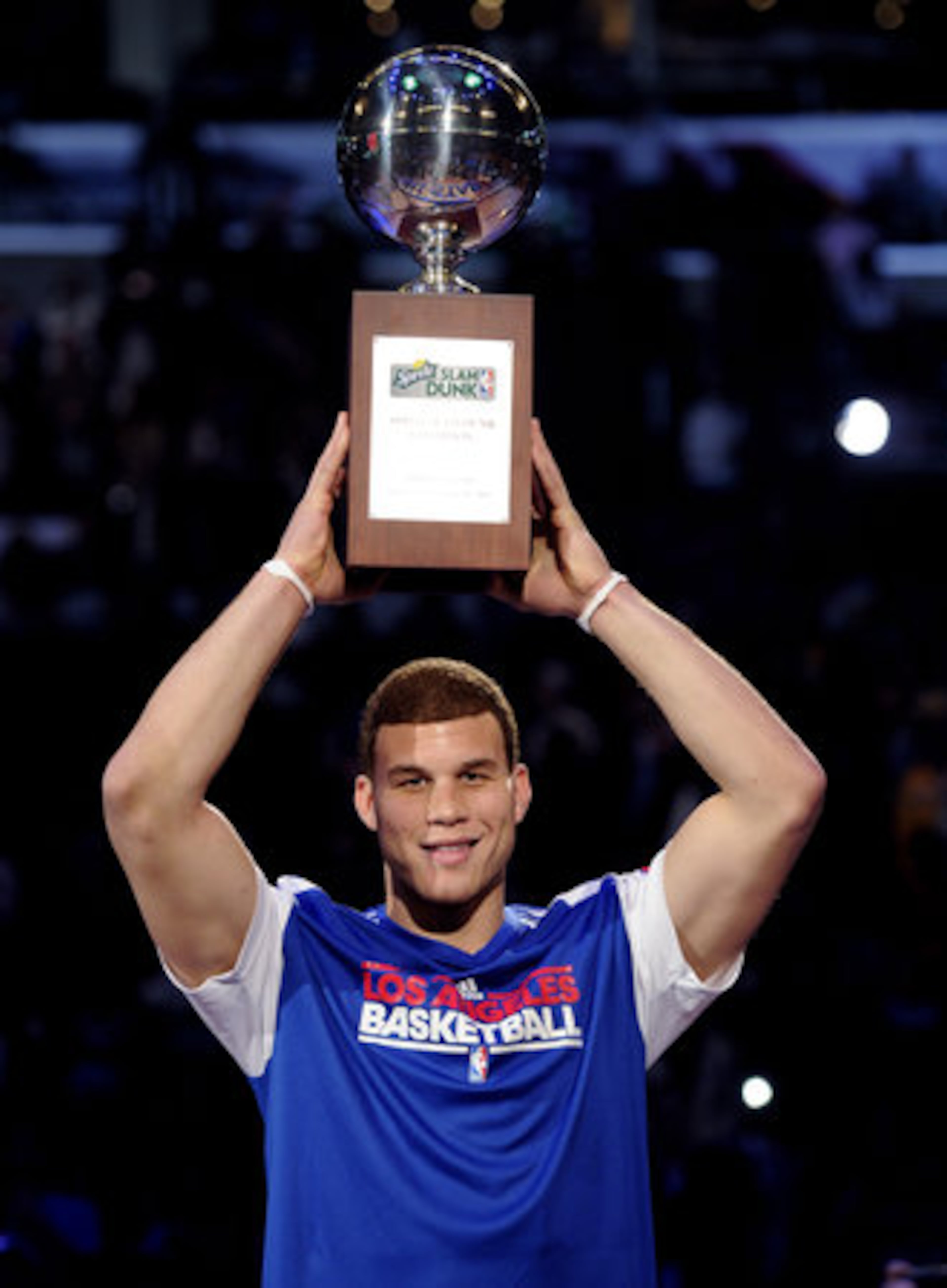 Los Angeles Clippers' Blake Griffin holds the trophy after winning the Slam Dunk Contest at the NBA basketball All-Star weekend, Saturday, Feb. 19, 2011, in Los Angeles.