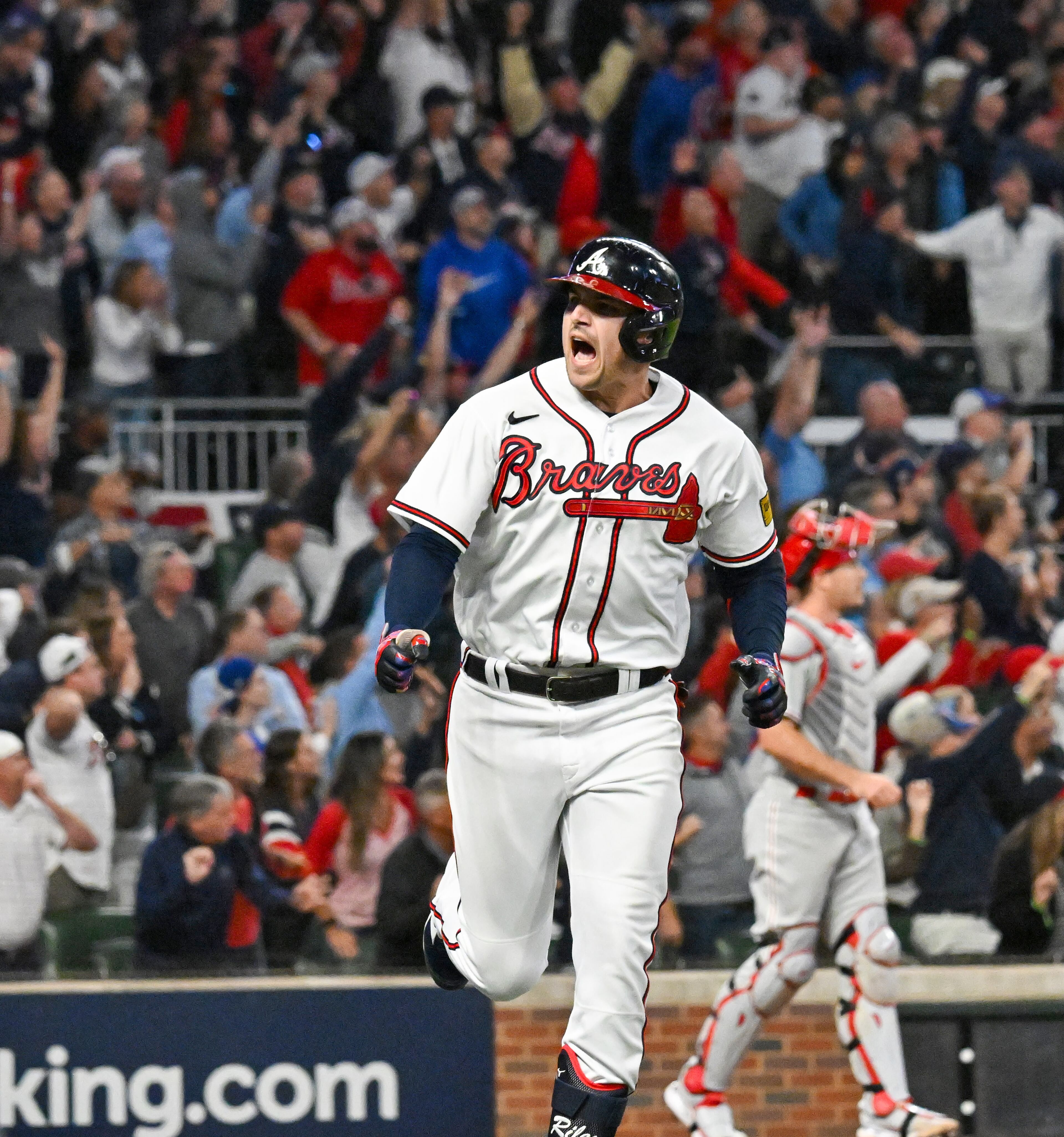 Atlanta Braves’ Austin Riley (27) celebrates a two-run home run against the Philadelphia Phillies during the eighth inning of NLDS Game 2 in Atlanta on Monday, Oct. 9, 2023. (Hyosub Shin / Hyosub.Shin@ajc.com)