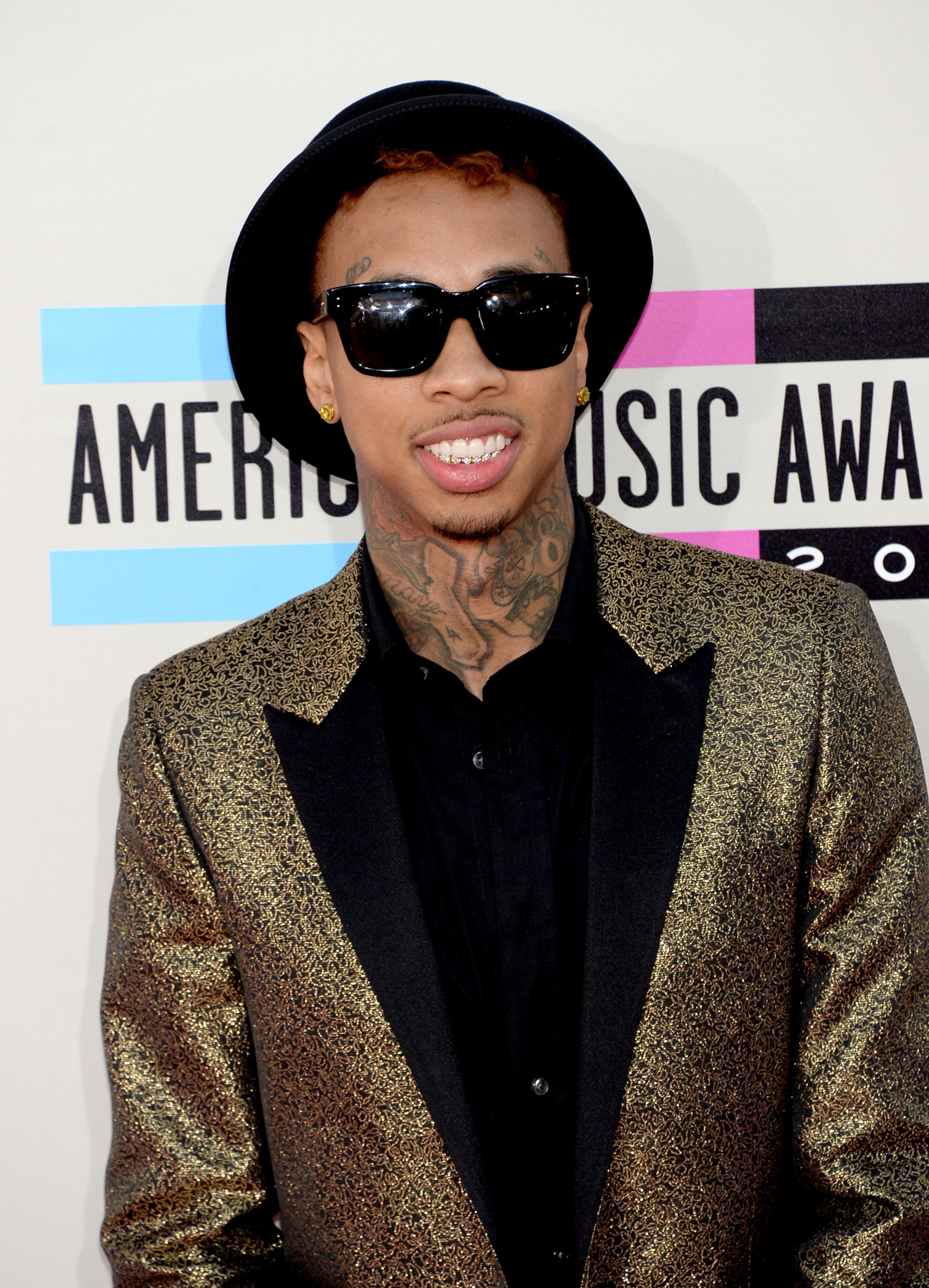 LOS ANGELES, CA - NOVEMBER 24: Rapper Wiz Khalifa attends the 2013 American Music Awards at Nokia Theatre L.A. Live on November 24, 2013 in Los Angeles, California. (Photo by Jason Kempin/Getty Images)