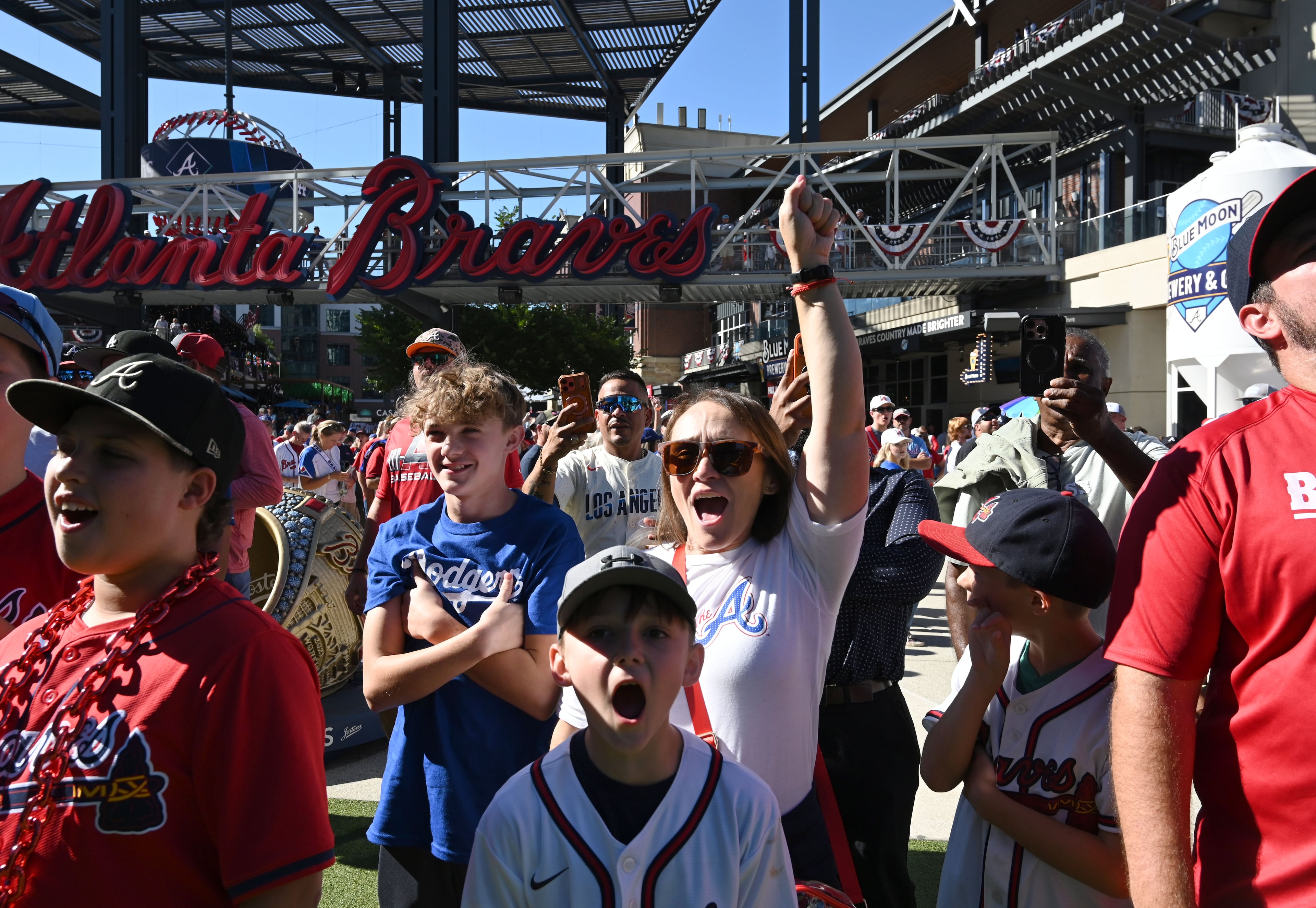 Atlanta Braves fans cheer as they wait for the gates to open before Game 3 of the National League Division Series against Los Angeles Dodgers at Truist Park on Tuesday, Oct. 6, 2026, in Atlanta. (Hyosub Shin/AJC)