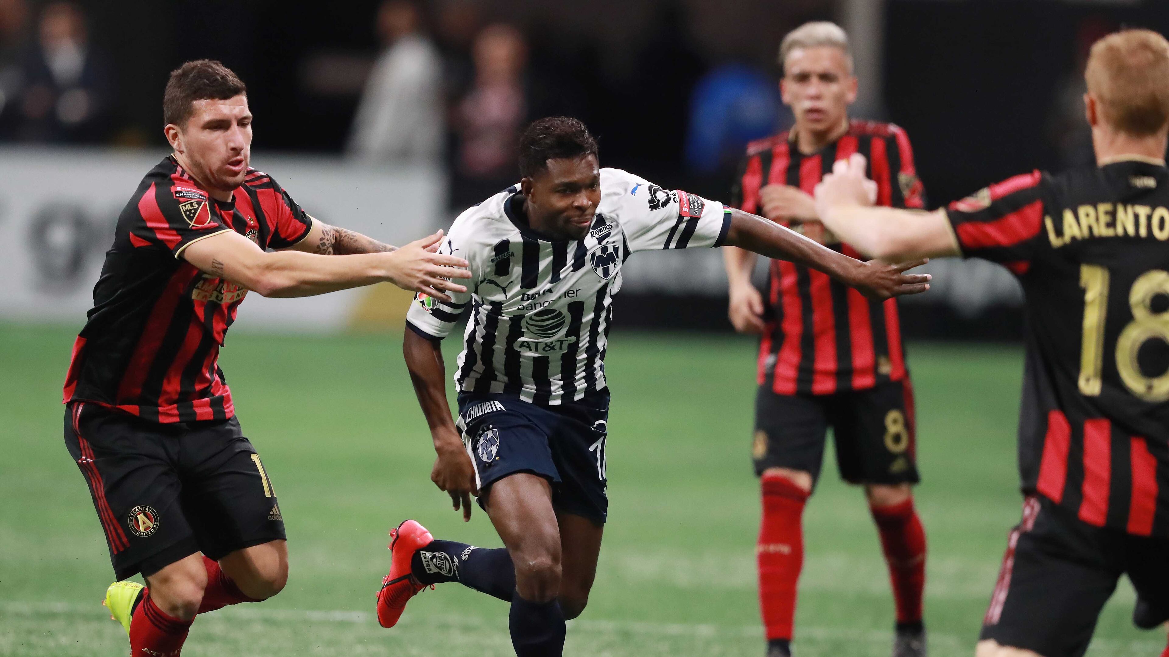 March 13, 2019 Atlanta: Atlanta United midfielder Eric Remedi defends against Monterrey player Aviles Hurtado with Ezequiel Barco and Jeff Larentowicz looking on in a Concacaf Champions league quarterfinal match on Wednesday, March 13, 2019, in Atlanta. Curtis Compton/ccompton@ajc.com