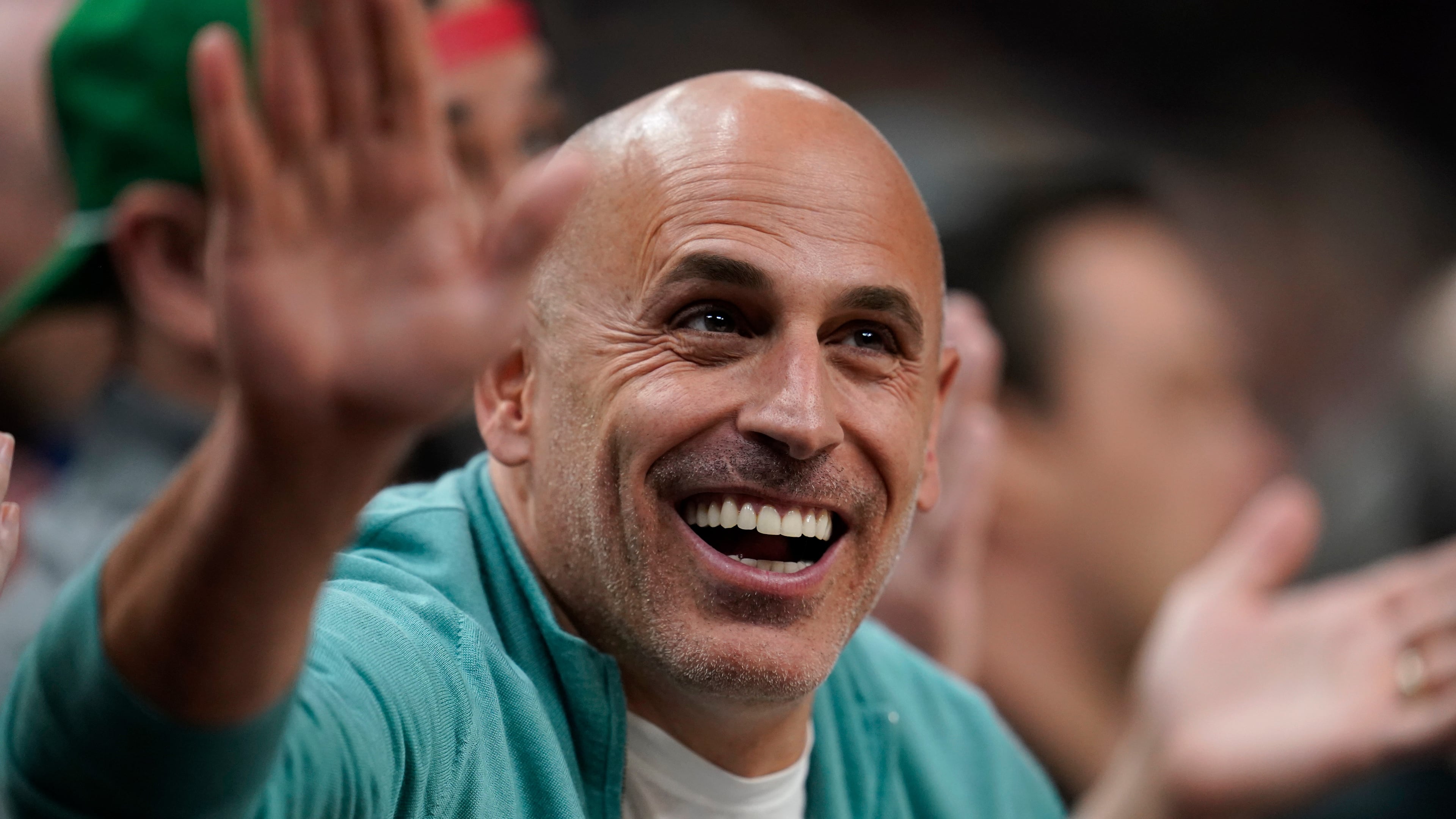 FILE - Minnesota Timberwolves co-owner Marc Lore cheers during the first half of an NBA basketball game against the New Orleans Pelicans, April 9, 2023, in Minneapolis. (AP Photo/Abbie Parr, File)