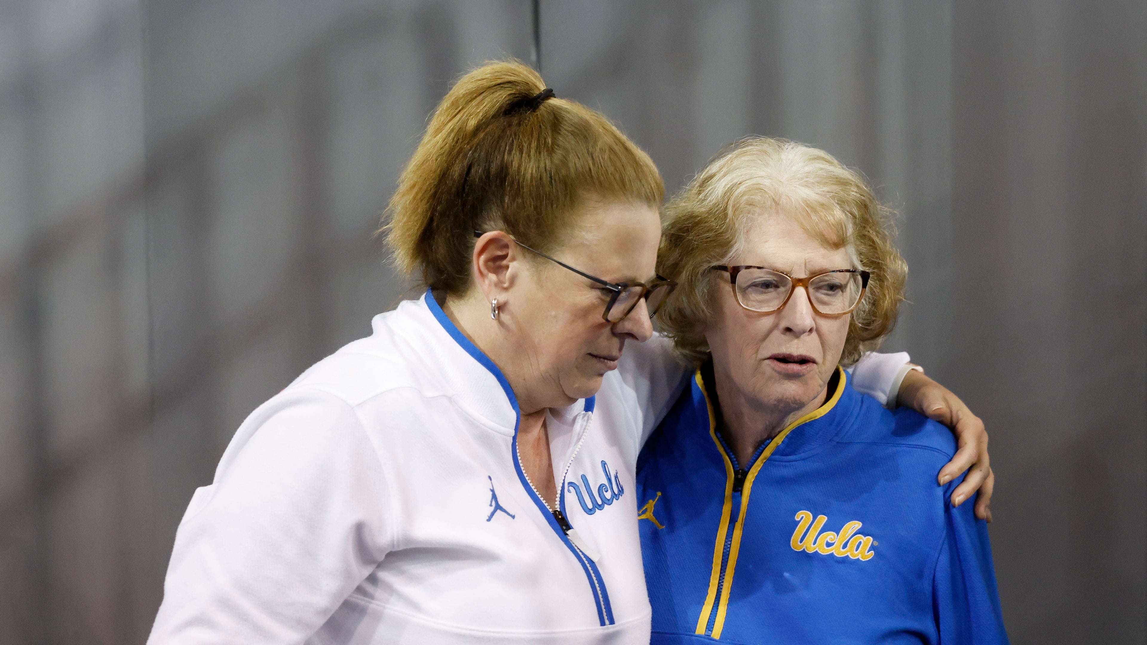 UCLA head coach Cori Close, left, embraces her mother, Patti Close, after speaking with the media after an NCAA college basketball game against Rutgers, Wednesday, Feb. 4, 2026, in Los Angeles. (AP Photo/Caroline Brehman)