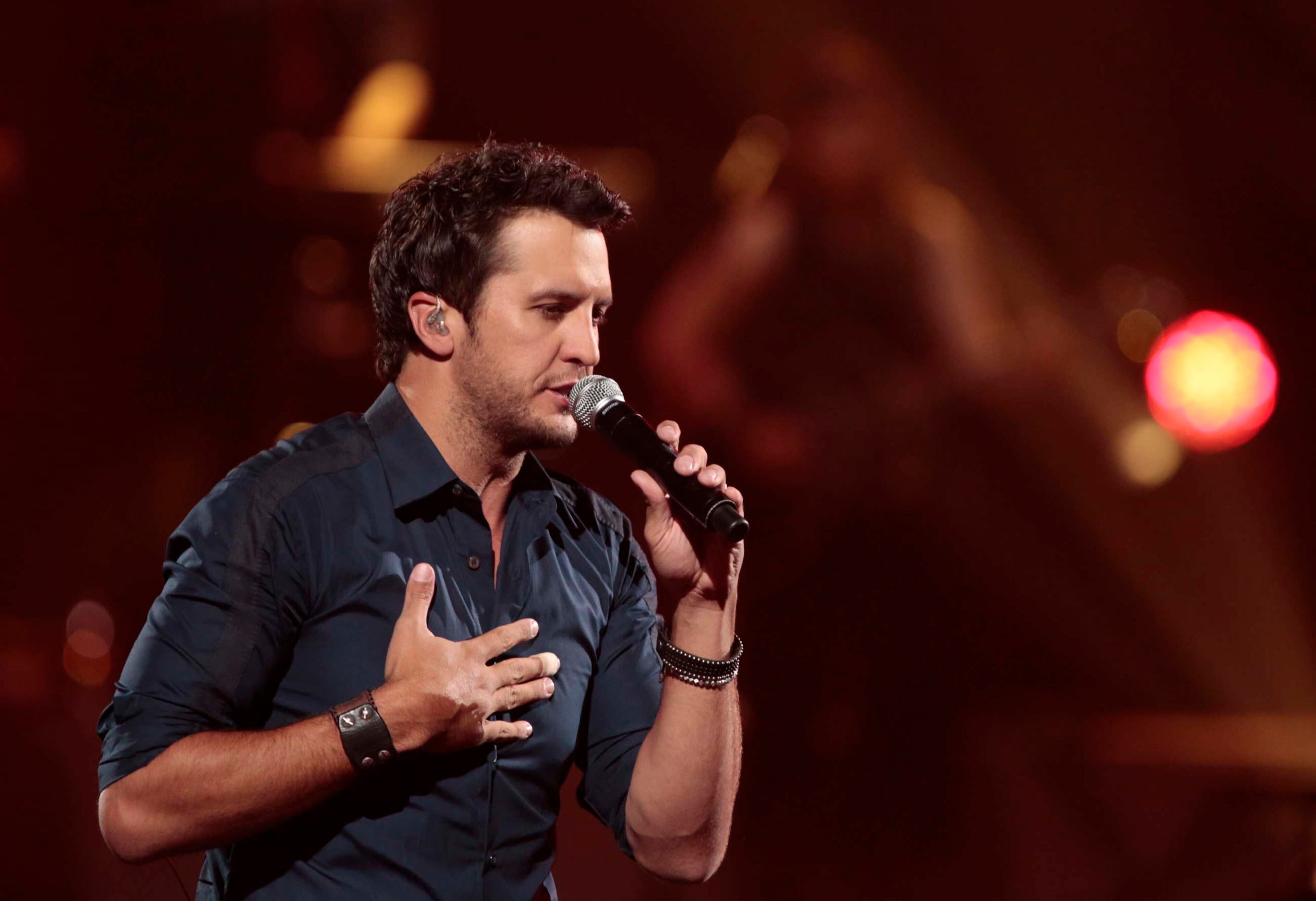 Luke Bryan during the Healing in the Heartland: Relief Benefit Concert at the Chesapeake Energy Arena in Oklahoma City, Okla., Wednesday, May 29,2013. Funds raised by the benefit will go to the United Way of Central Oklahoma, for recovery efforts for those affected by the May 20 tornado. (AP Photo/NBC, Brett Deering)