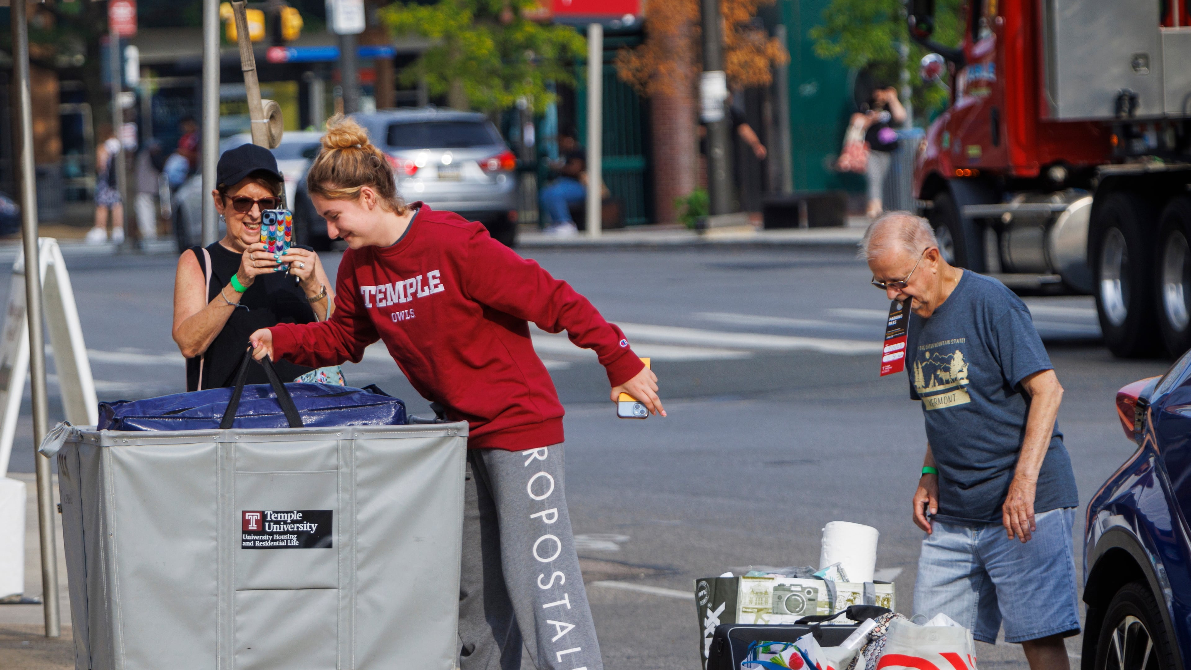 FILE - Emily Danenhower, 17, loads her container as grandparents Rena Ruben and Walter McClain help move her into college as students moved into their dorms during move-in-day at Temple University in Philadelphia, on Monday, Aug. 21, 2023. (Alejandro A. Alvarez/The Philadelphia Inquirer via AP, File)